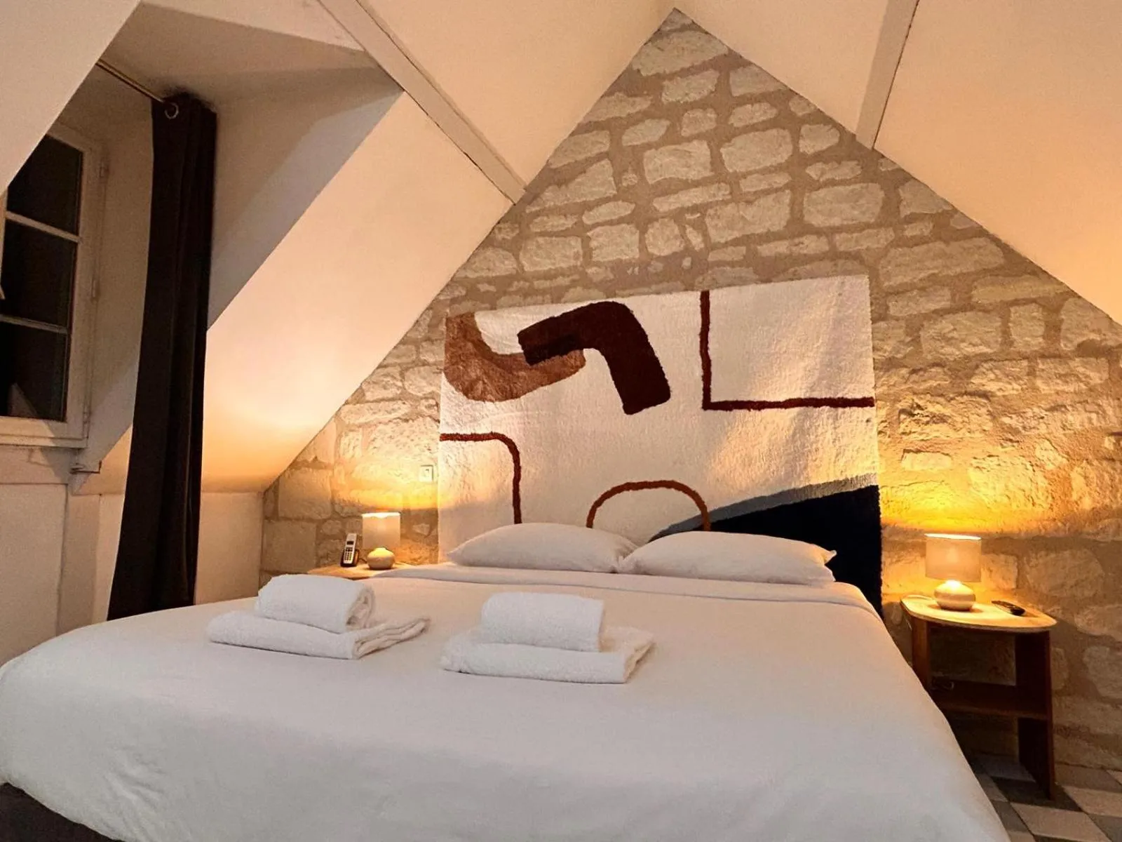 Bed in Logis Demeure de la Vignole