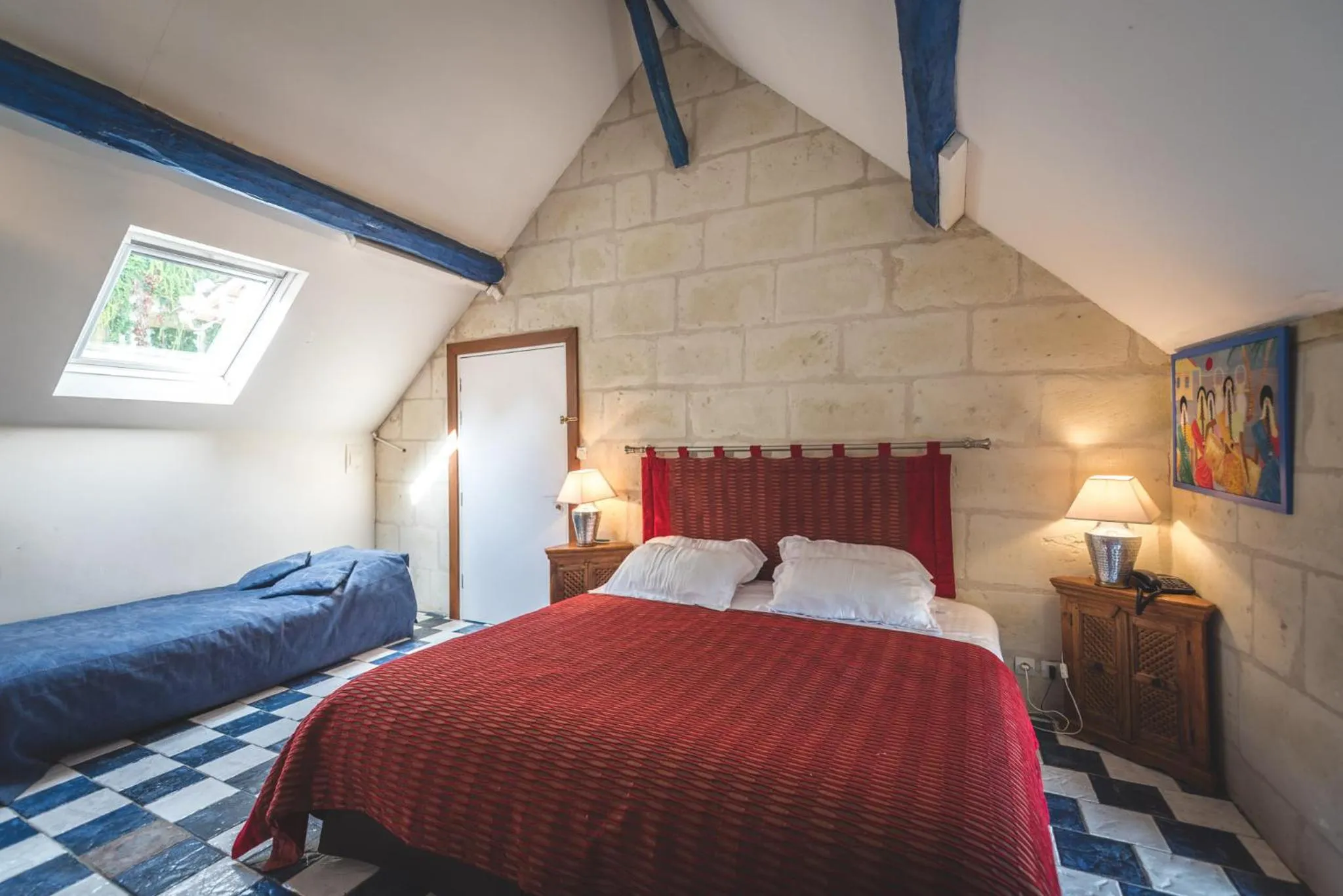 Bed in Logis Demeure de la Vignole