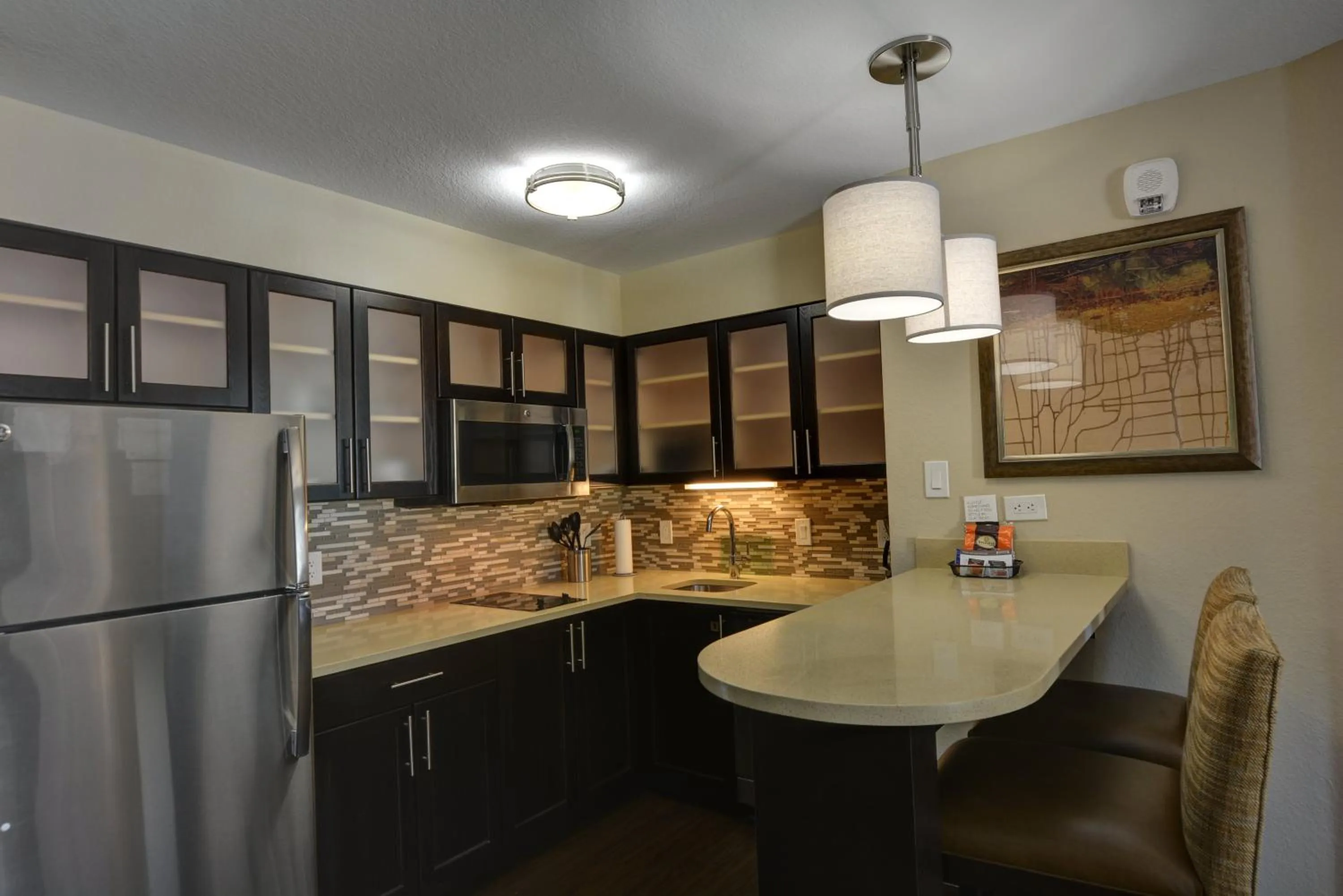 Photo of the whole room, Kitchen/Kitchenette in Staybridge Suites Lakeland West