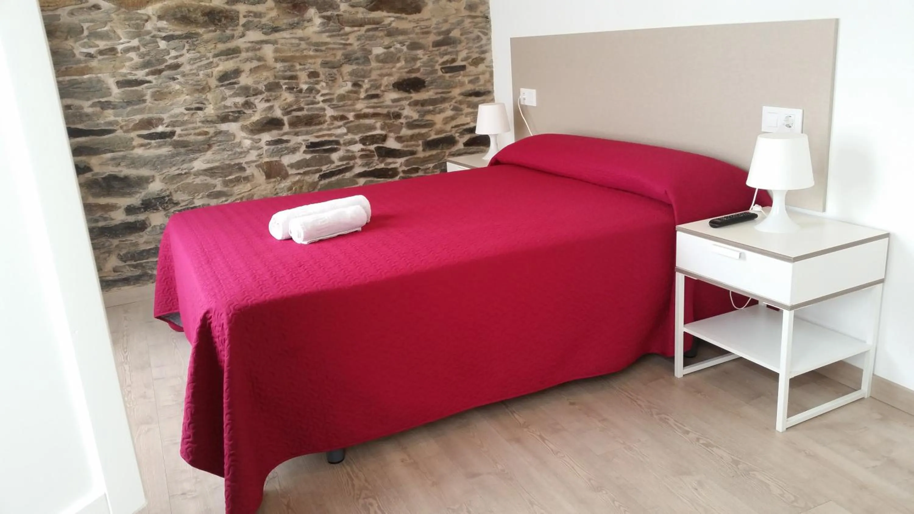 Bed in Pensión Domus Gallery