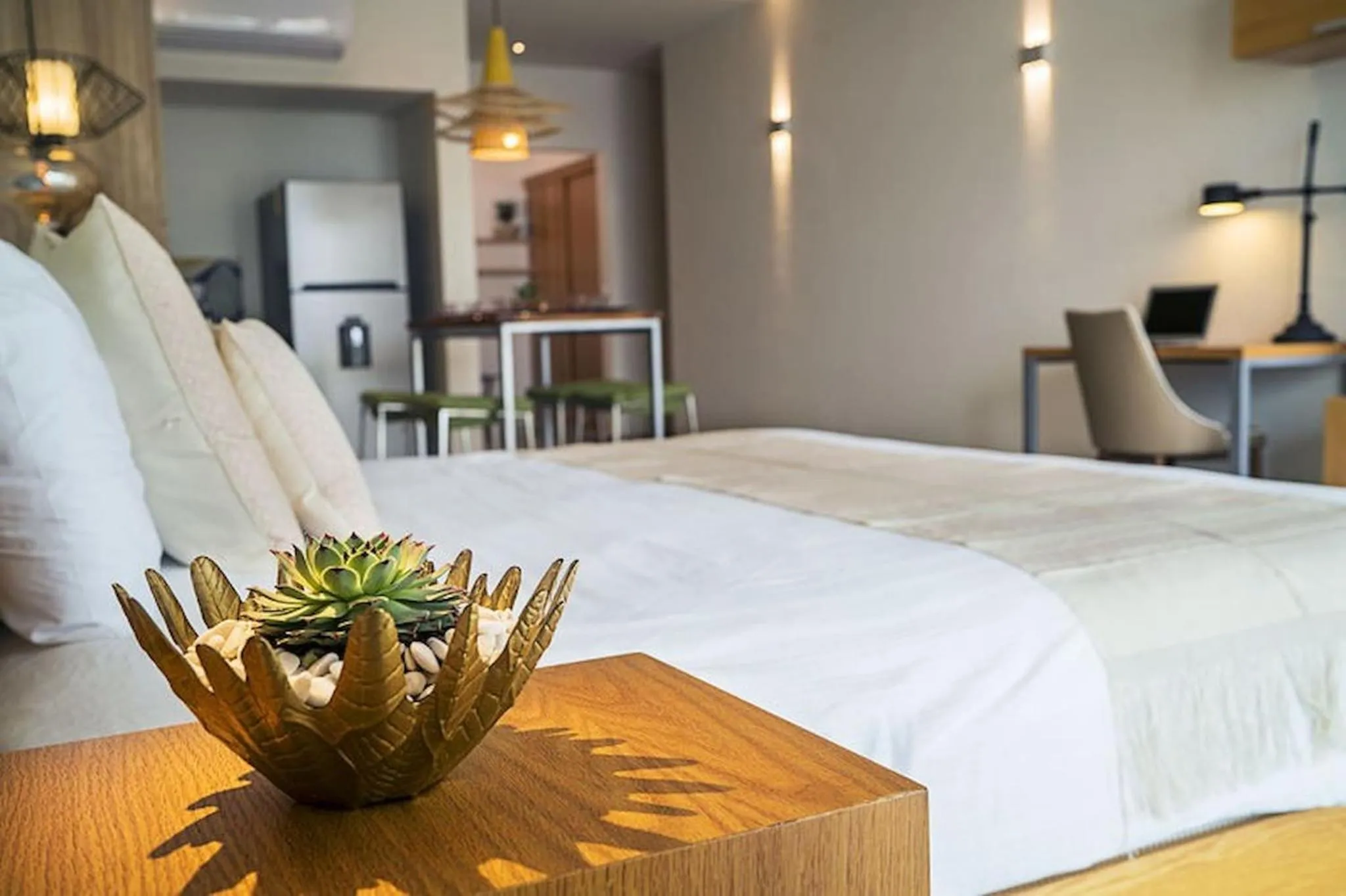 Bed in Opal Suites Apartments