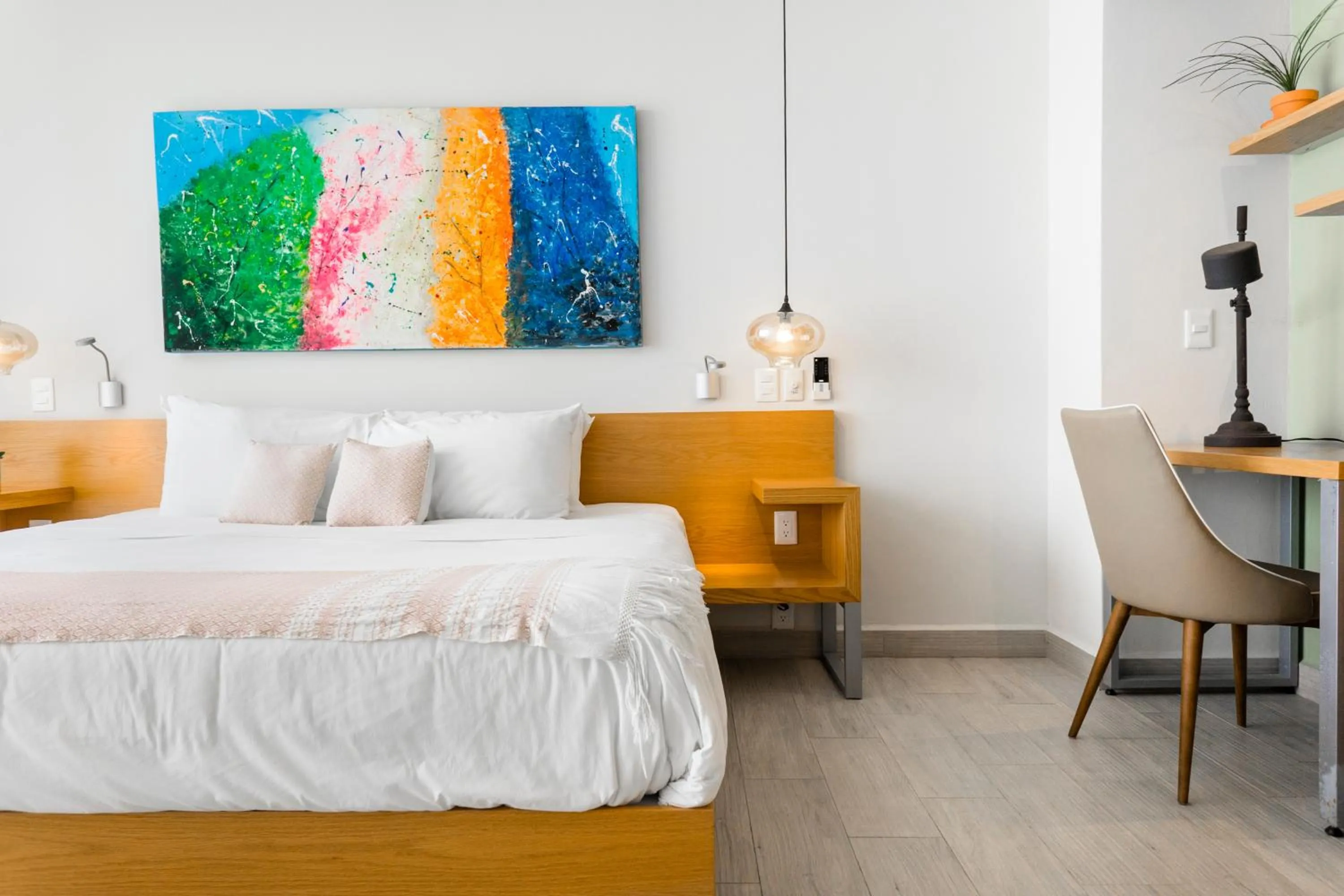 Bed in Opal Suites Apartments