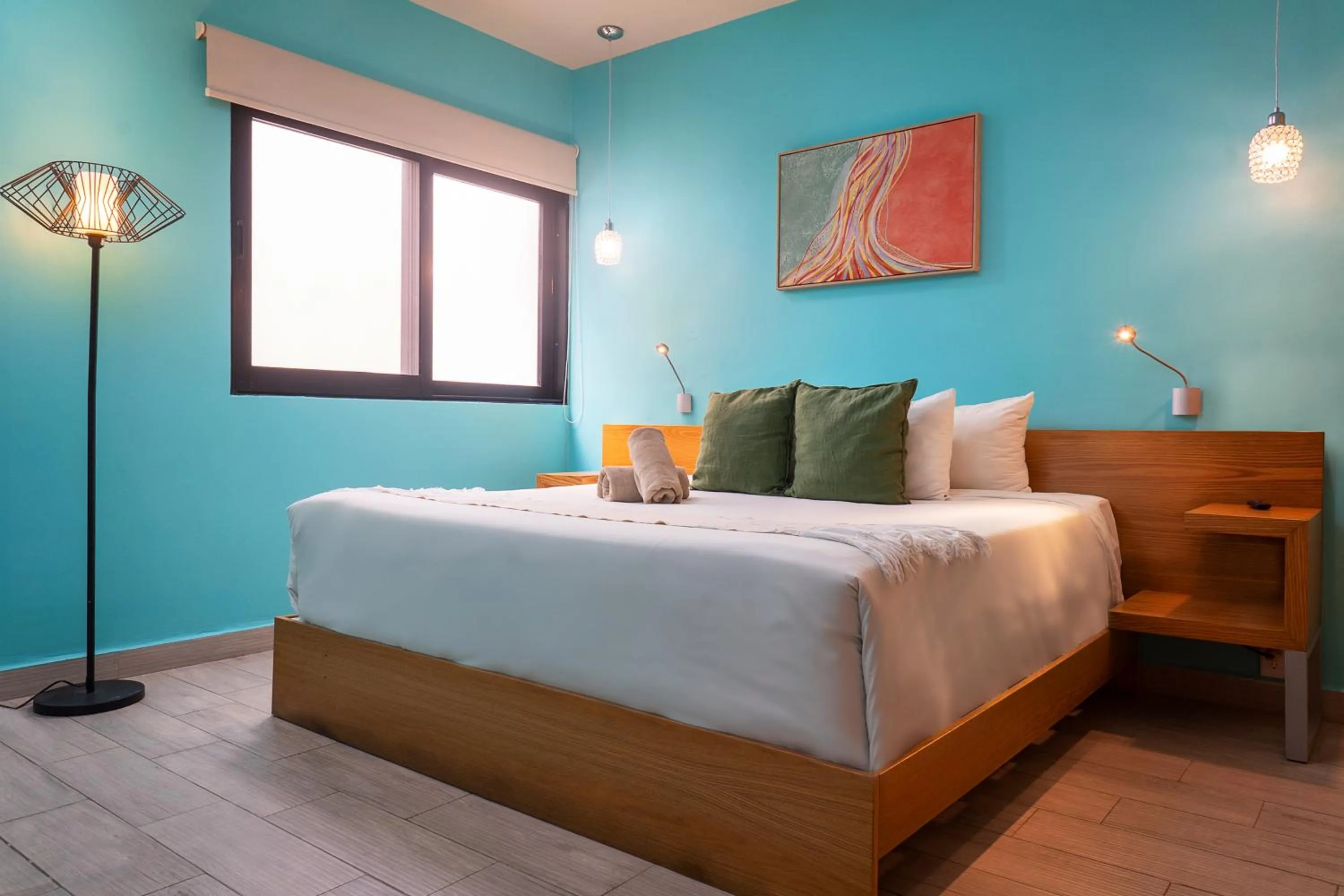 Bed in Opal Suites Apartments