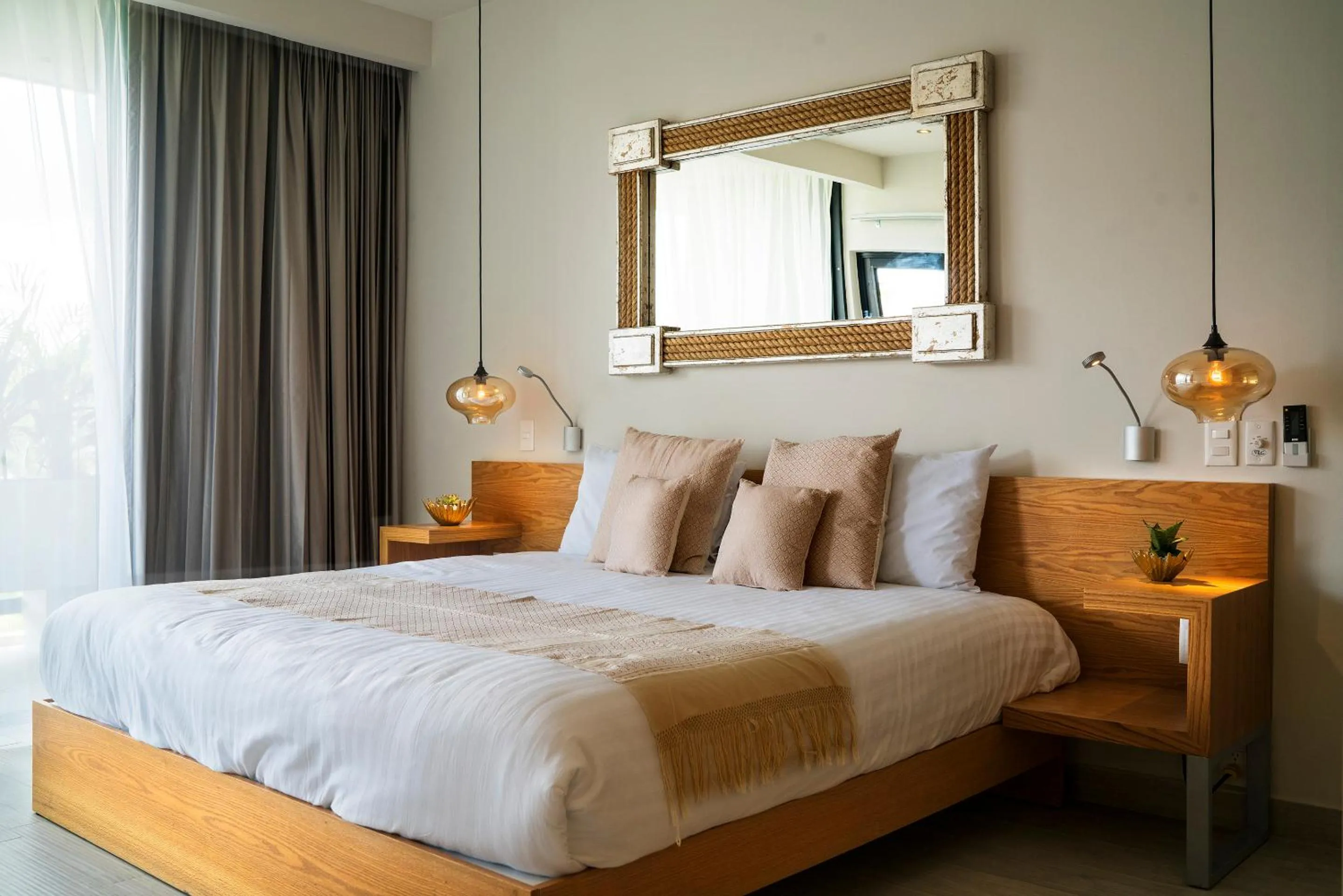 Bed in Opal Suites Apartments