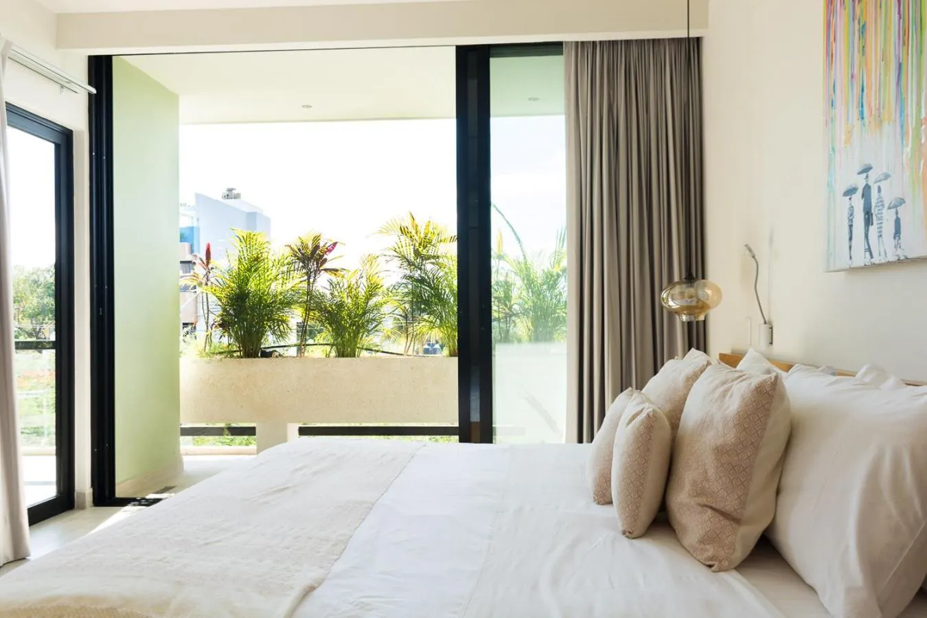 Bed in Opal Suites Apartments