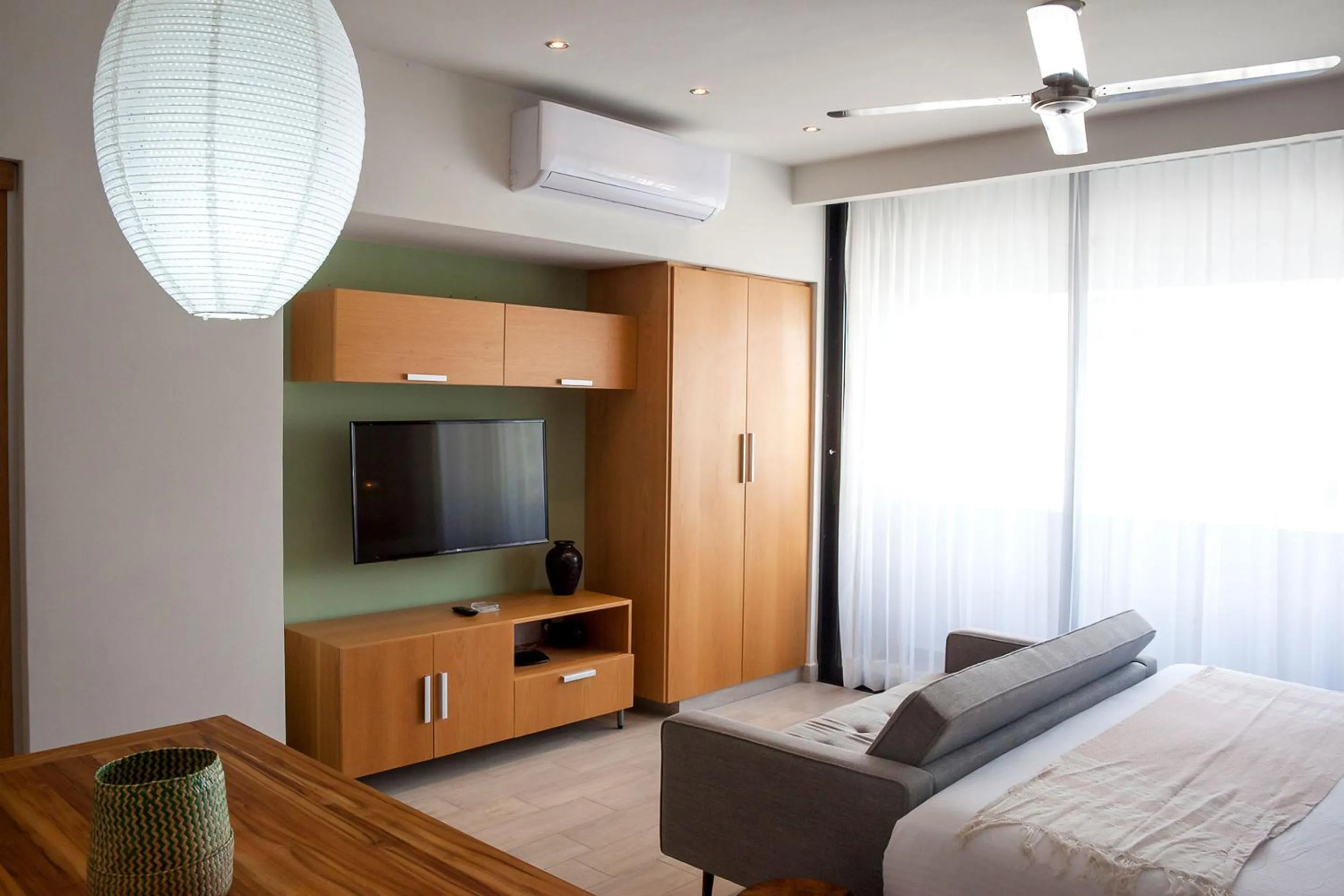 TV and multimedia, Bed in Opal Suites Apartments