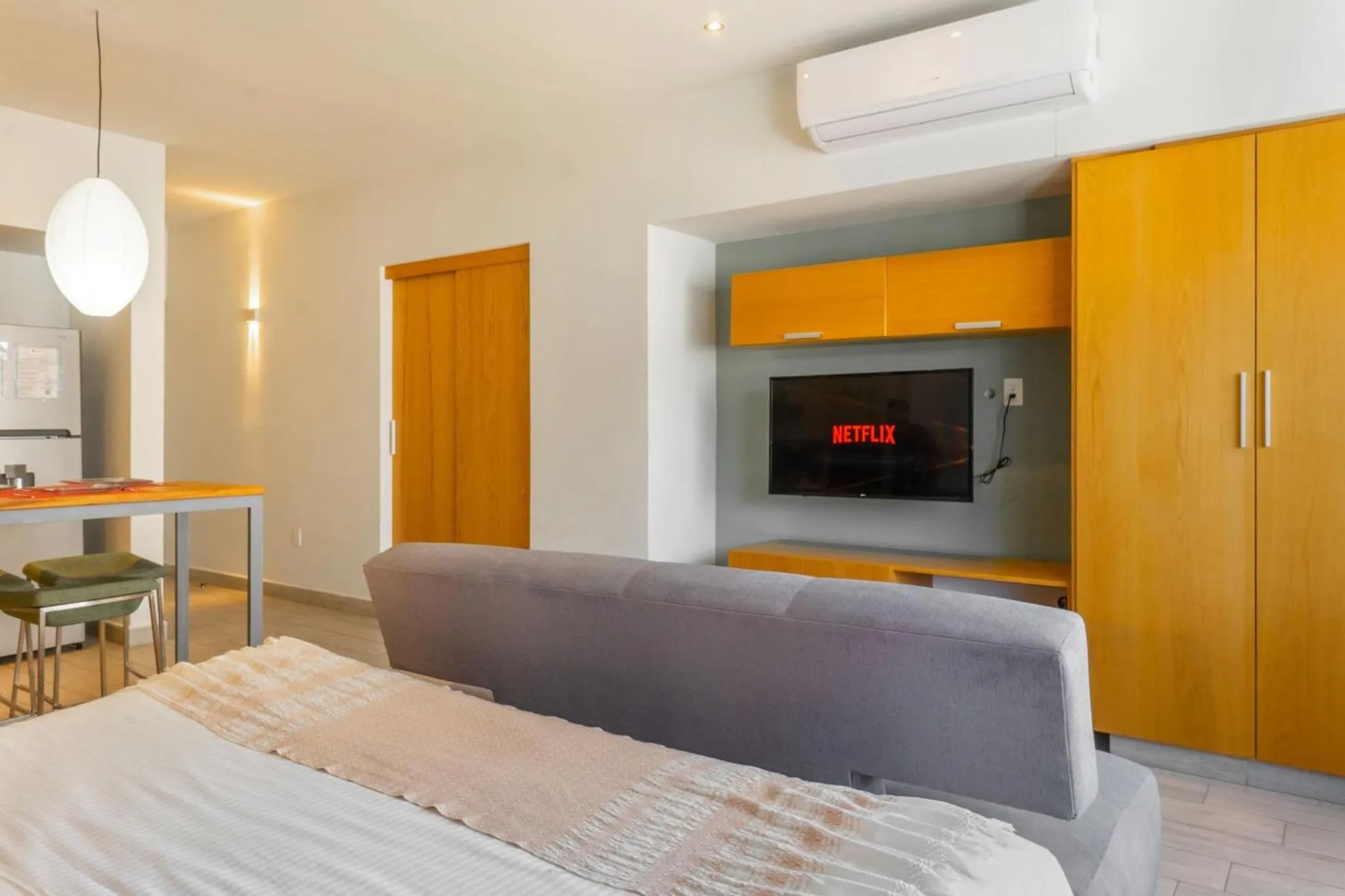 Bed in Opal Suites Apartments