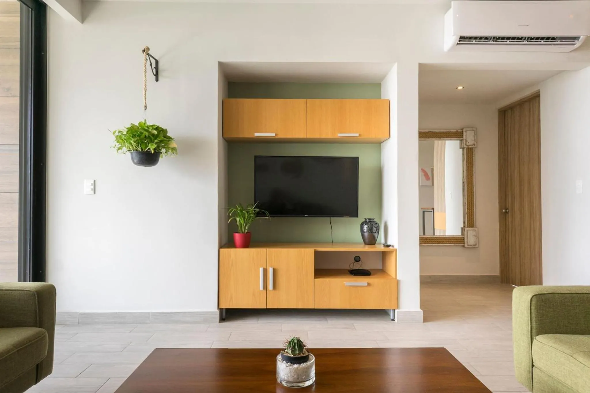 Communal lounge/ TV room in Opal Suites Apartments