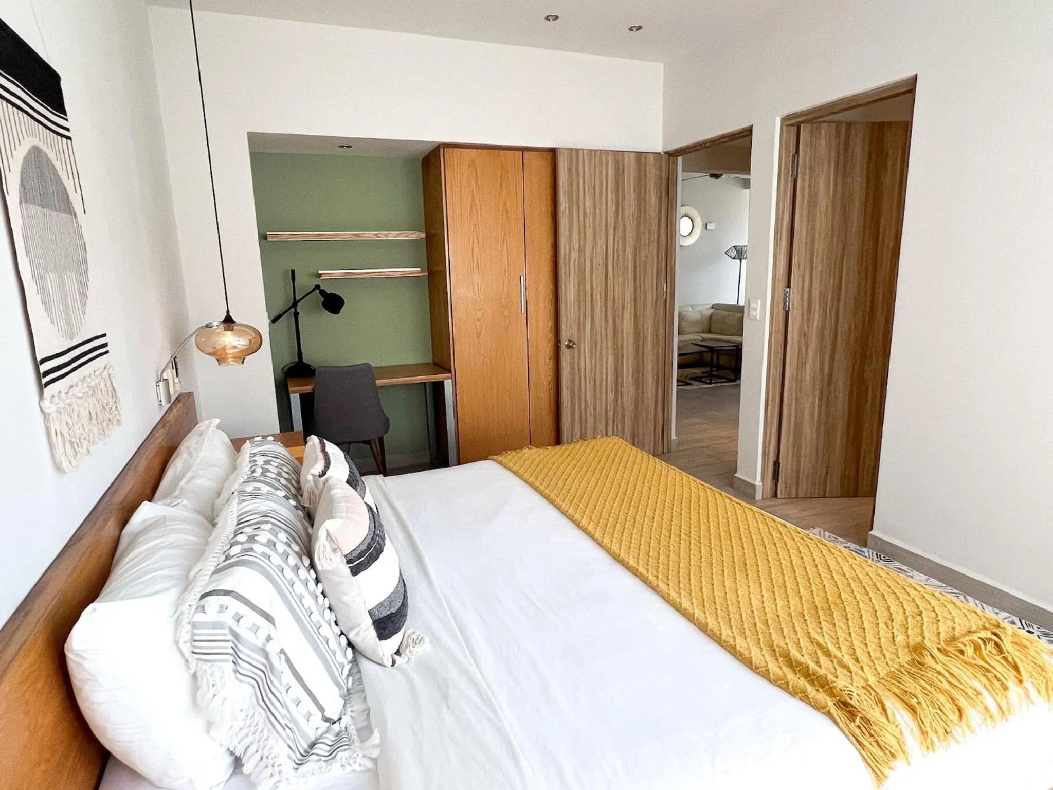 Bed in Opal Suites Apartments