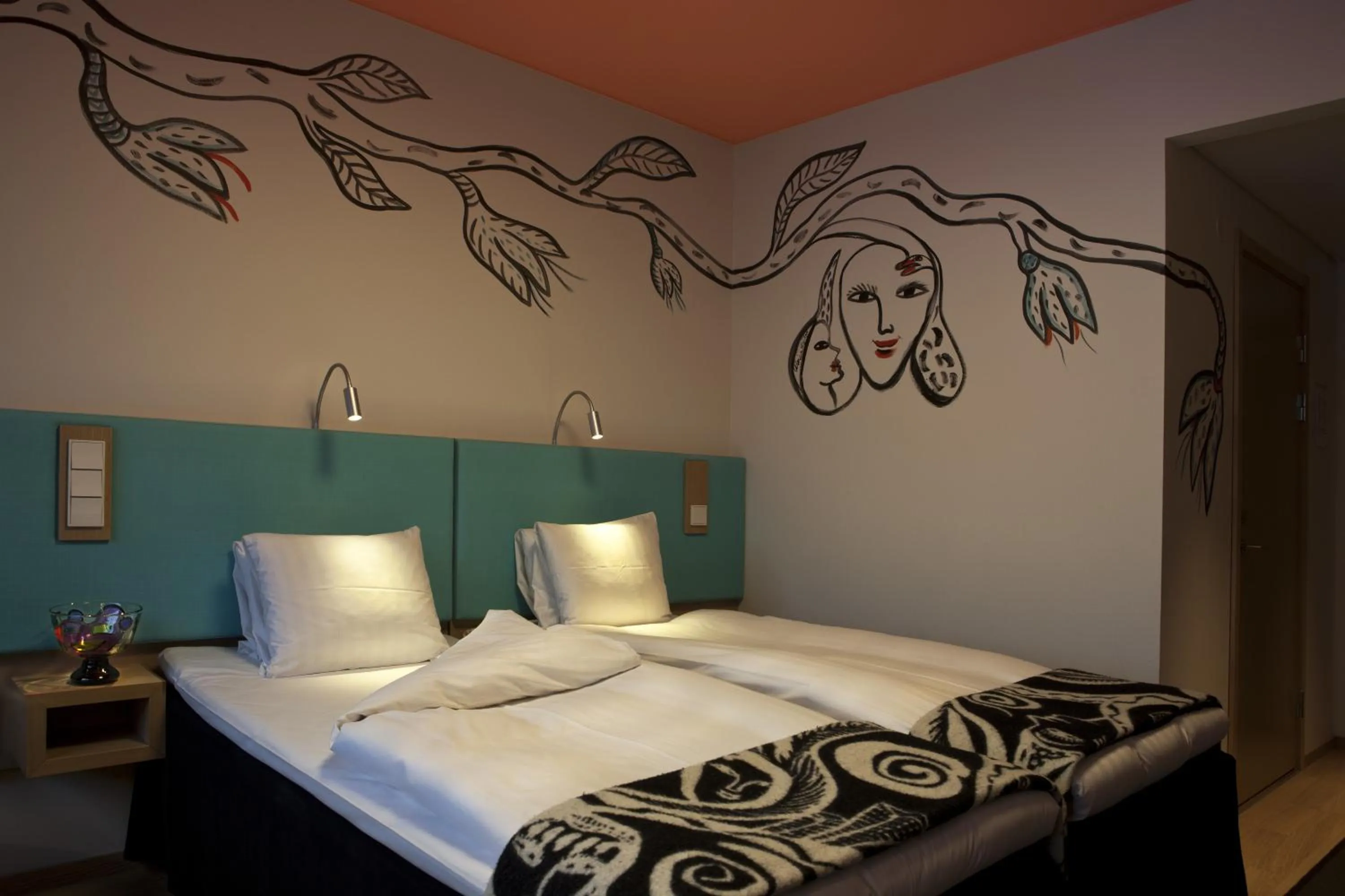 Bed in Kosta Boda Art Hotel