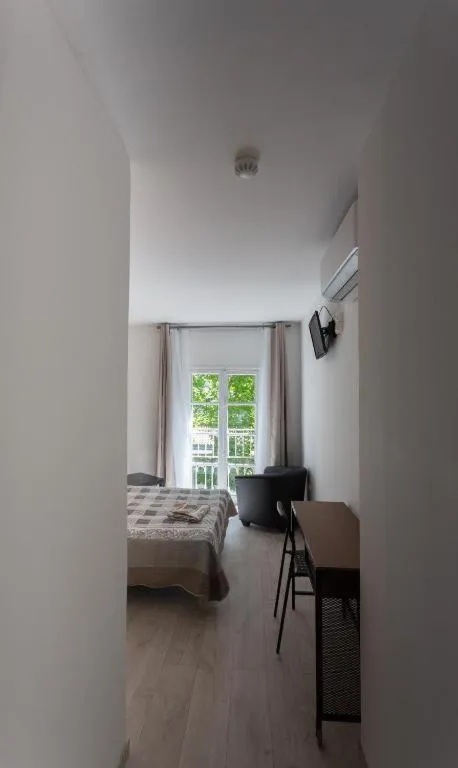 Bed in Hotel Alizéa