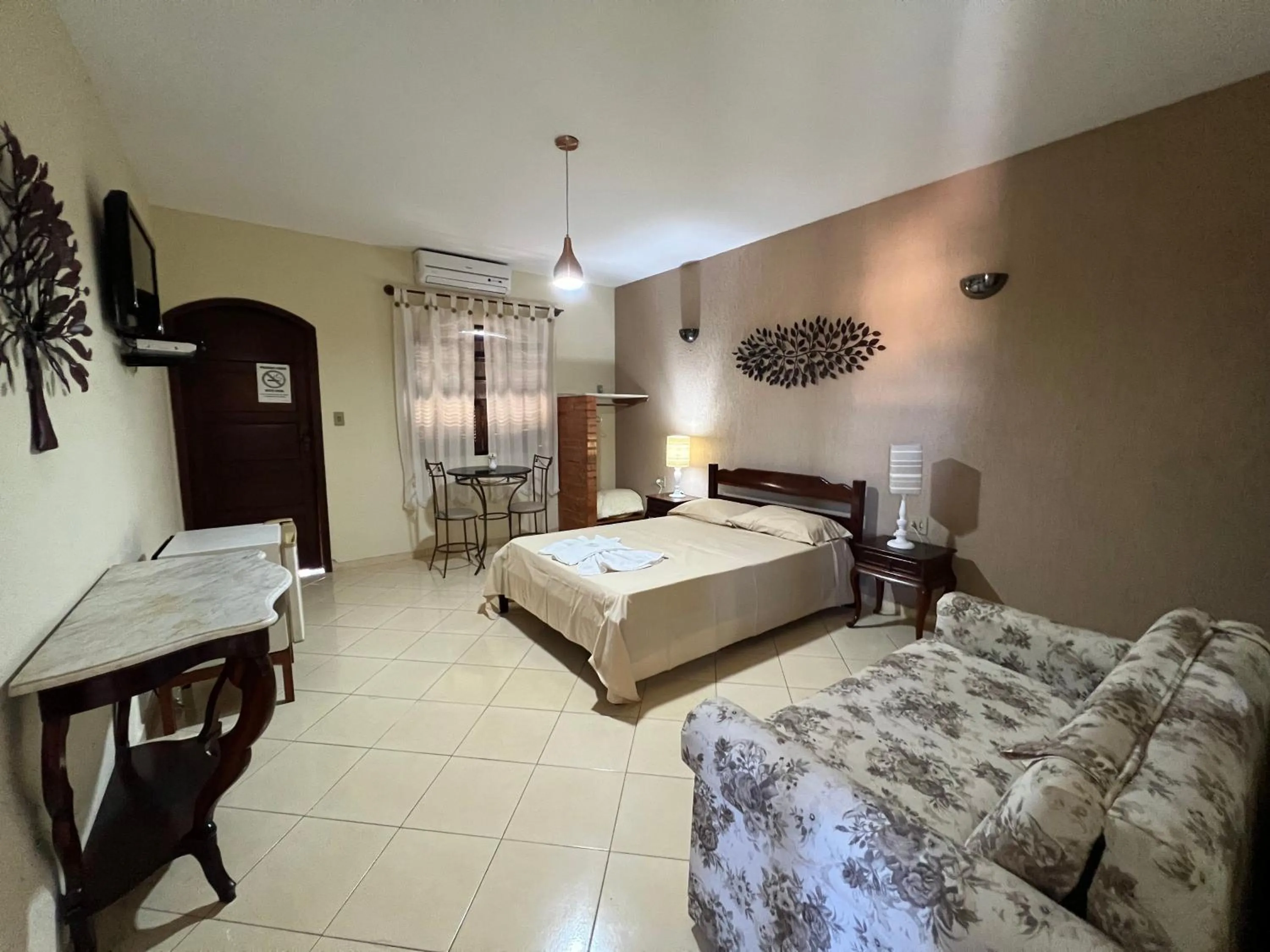 Bed in Pousada Por do Sol