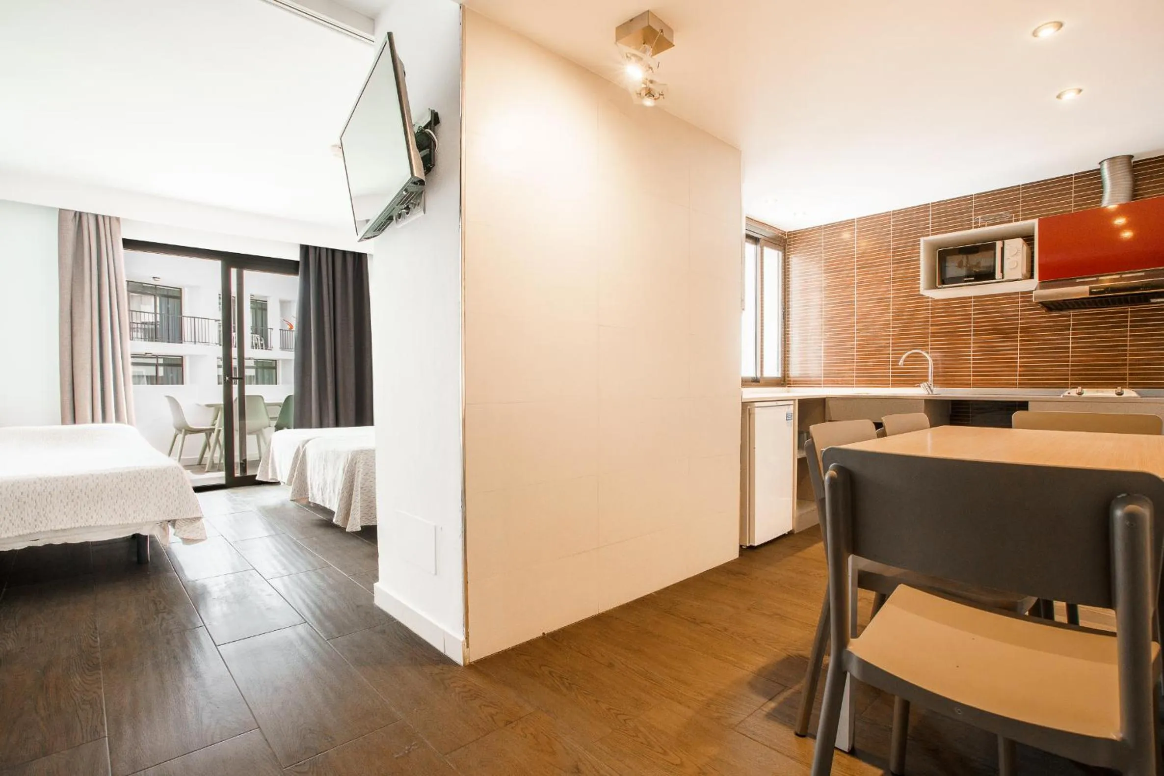 Kitchen or kitchenette, Bed in Apartamentos San Francisco