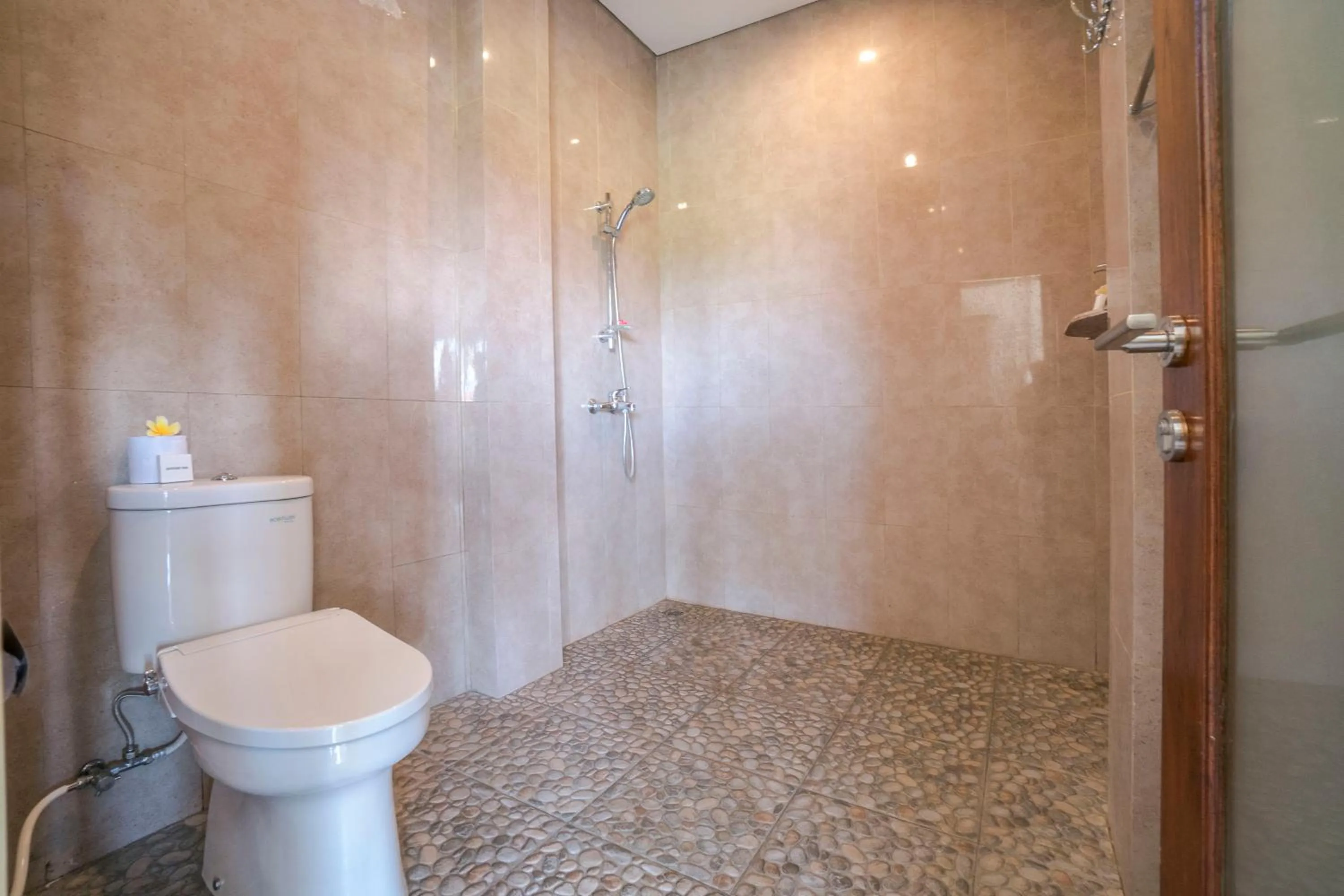 Bathroom in Adi Bisma Inn by Mahaputra