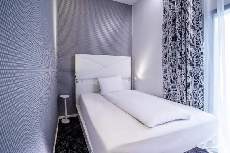 Bed in Magic Hotel Bergen City Center, a member of Radisson Individuals