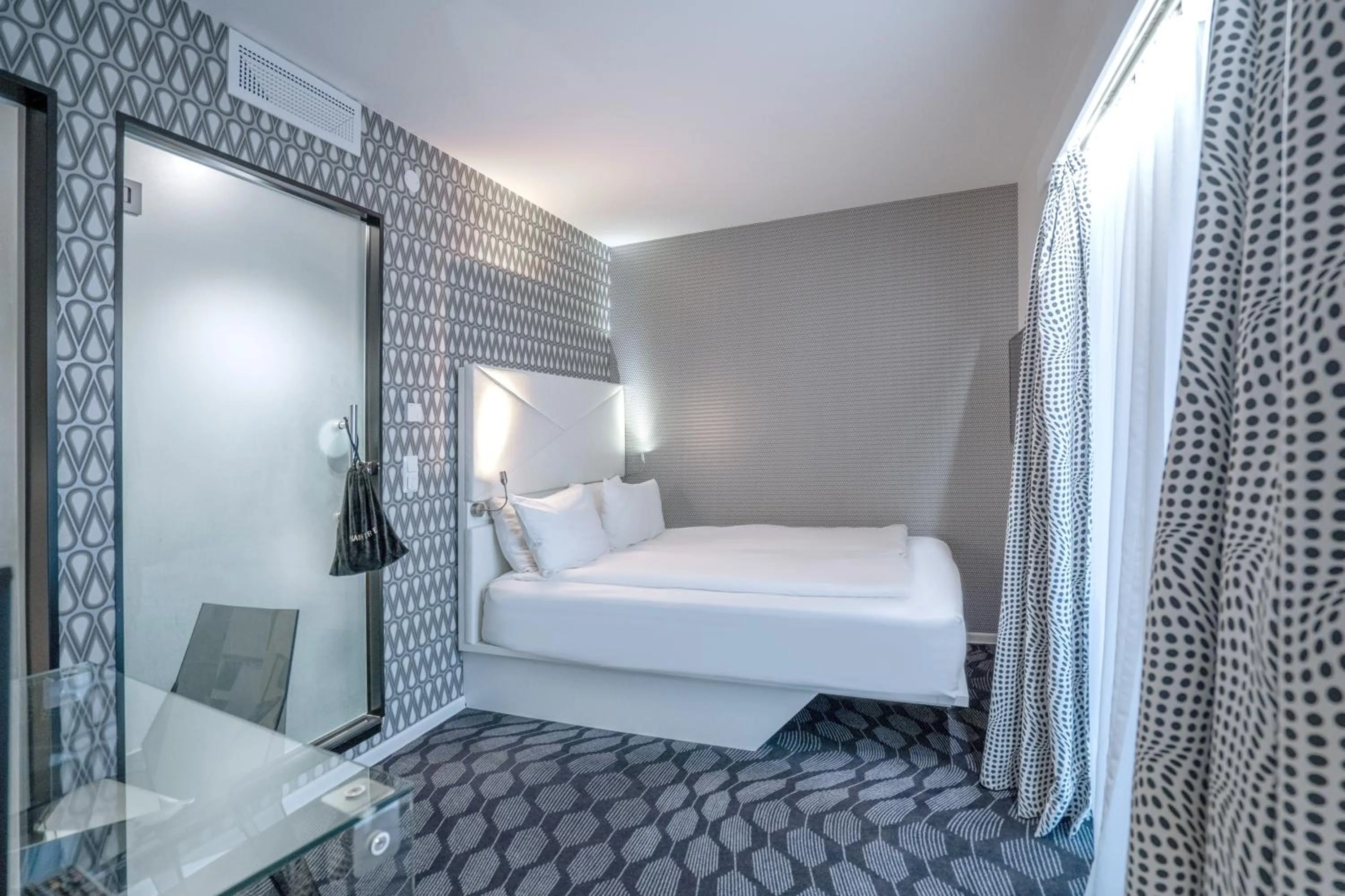 Bed in Magic Hotel Bergen City Center, a member of Radisson Individuals