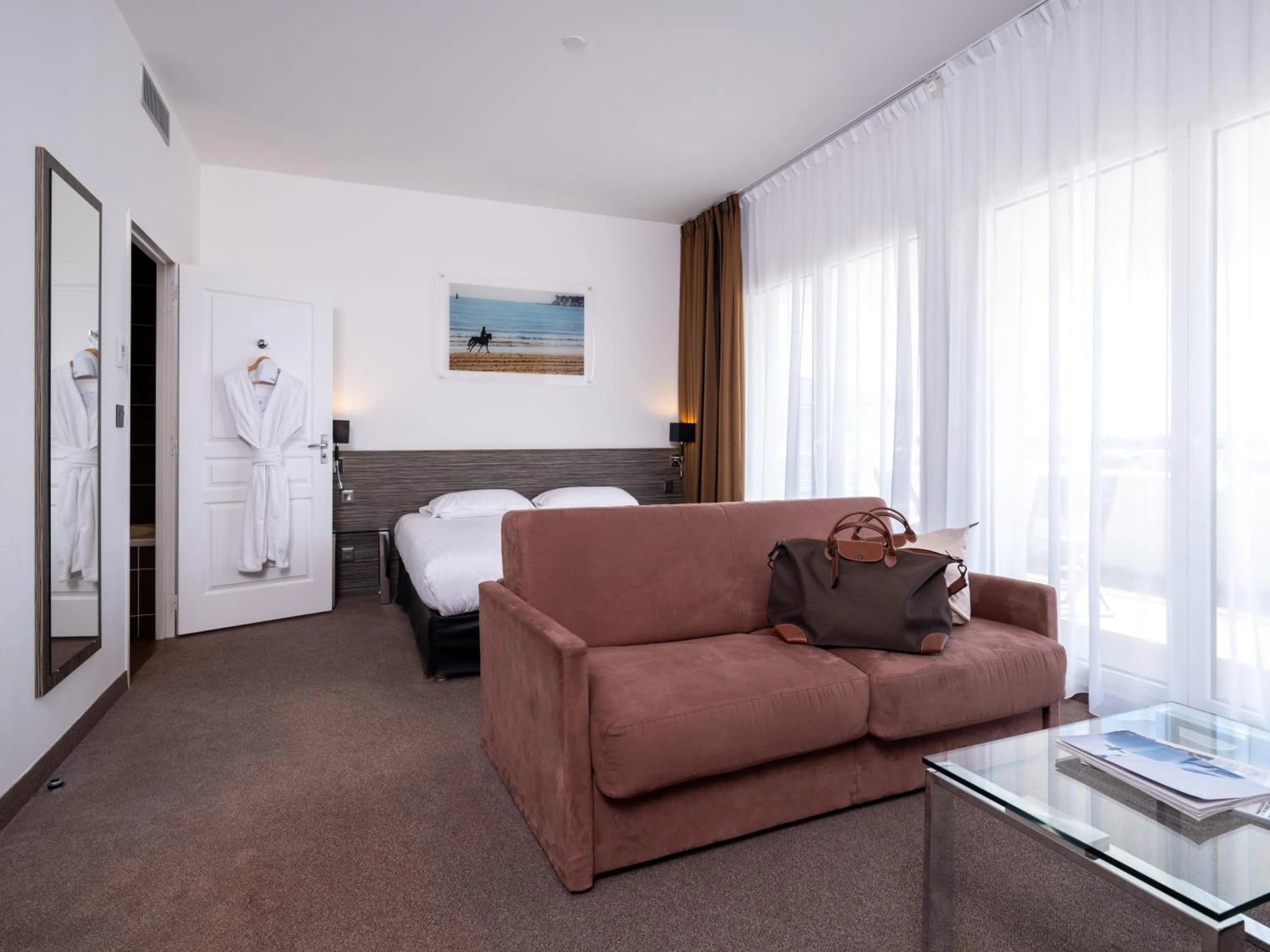 Photo of the whole room, Bed in Golden Tulip La Baule Hotel and Residence