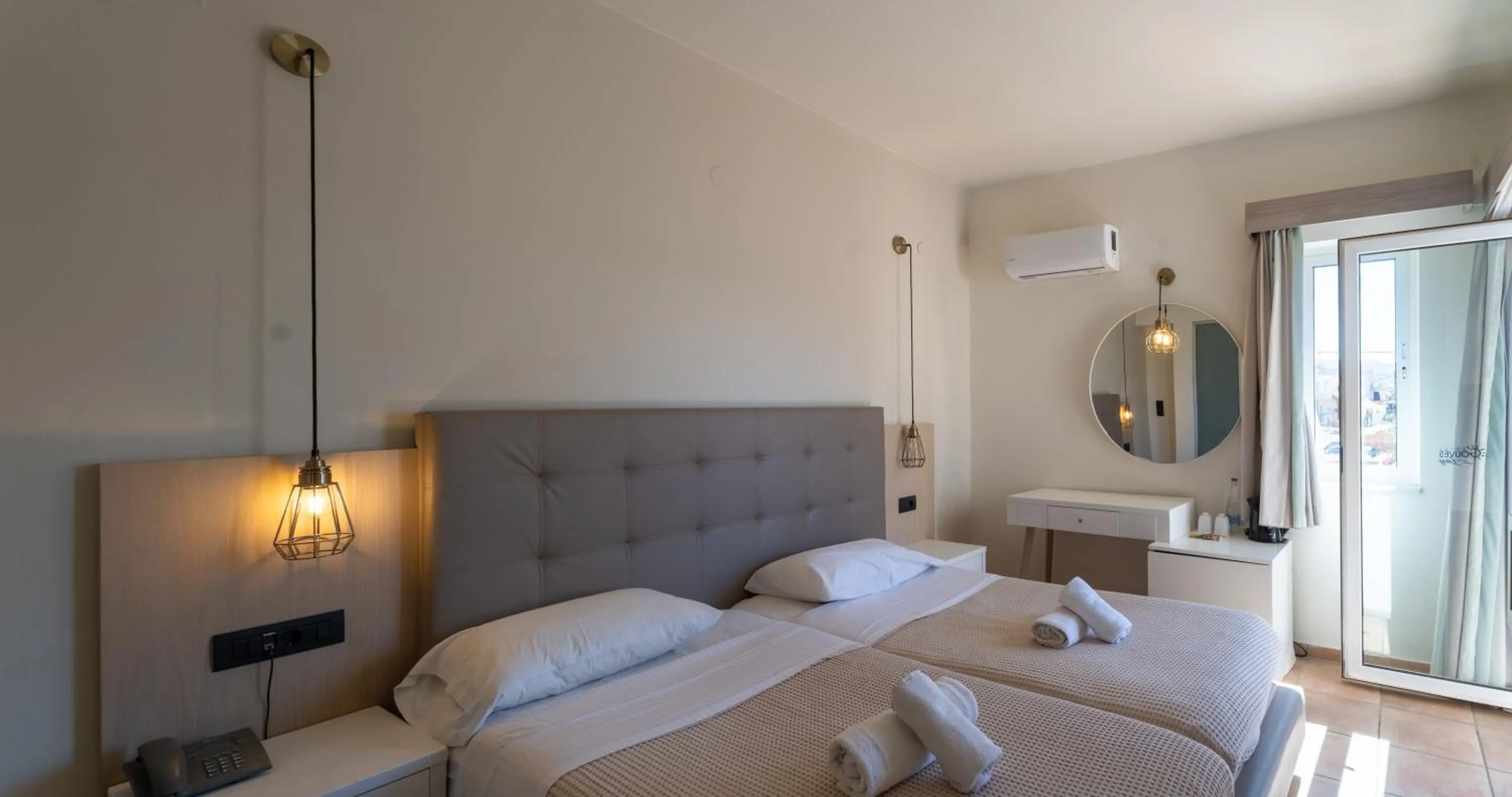 Bedroom, Bed in Gouves Bay by Omilos Hotels