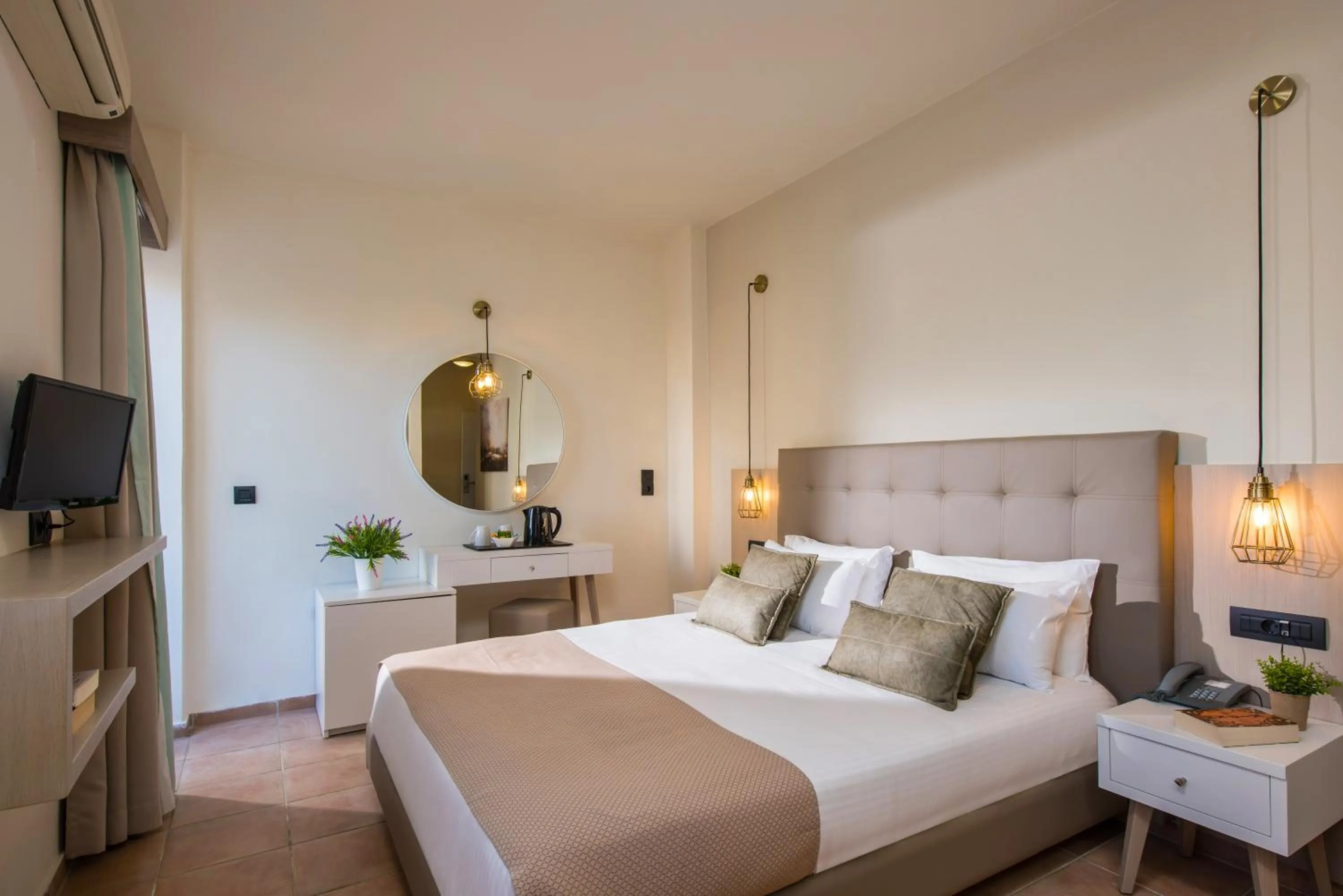 Bed in Gouves Bay by Omilos Hotels