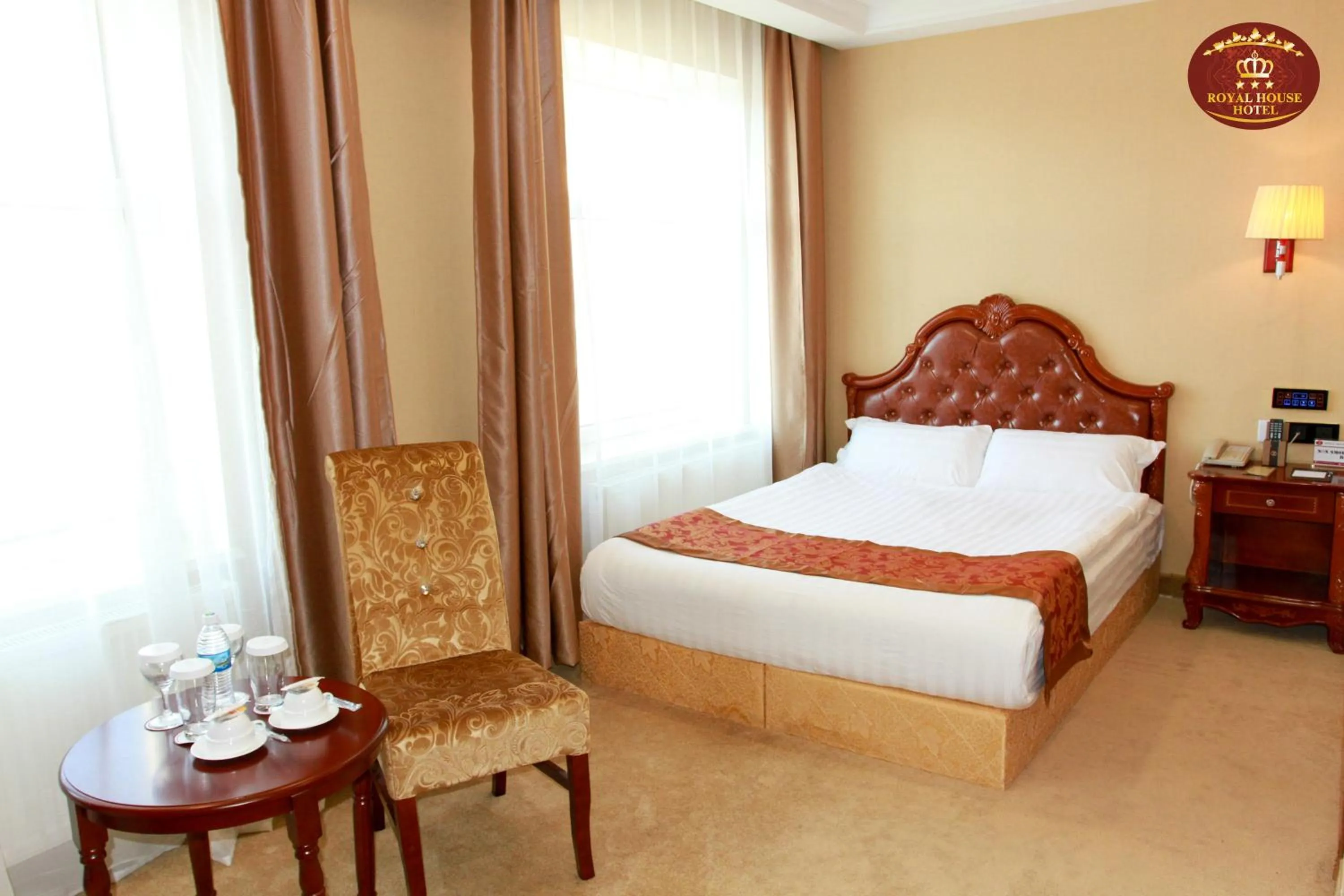 Bed in Royal House Hotel 2