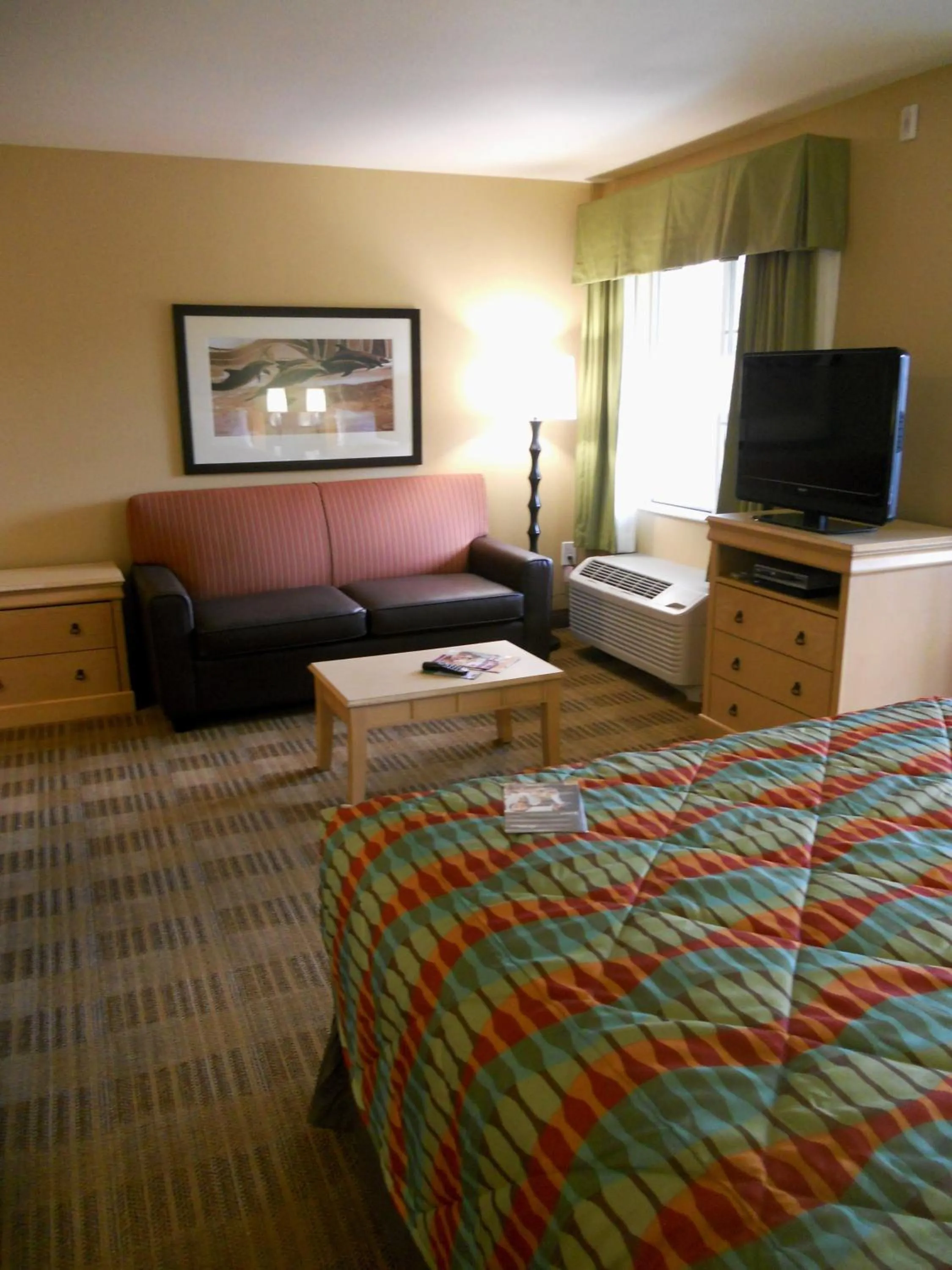 Seating area, Bed in Extended Stay America Suites - Orlando - Lake Buena Vista