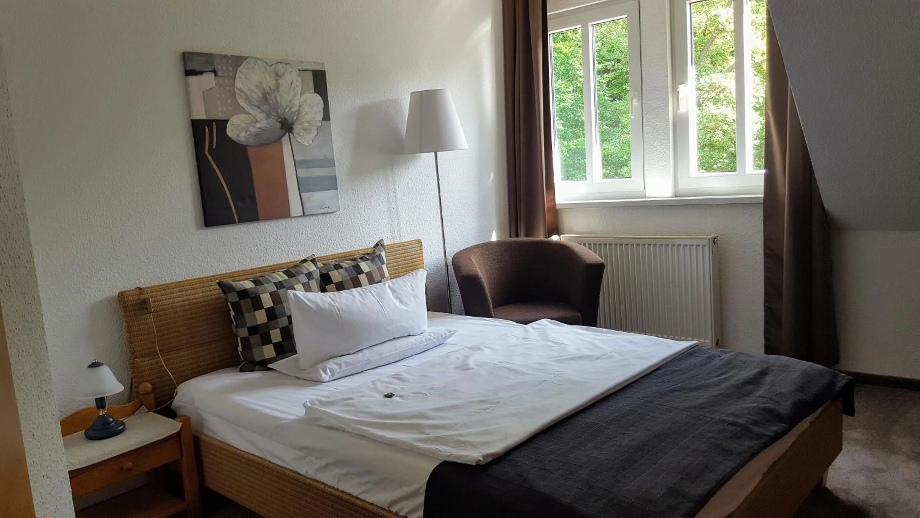Photo of the whole room, Bed in Kurhotel Bad Suderode