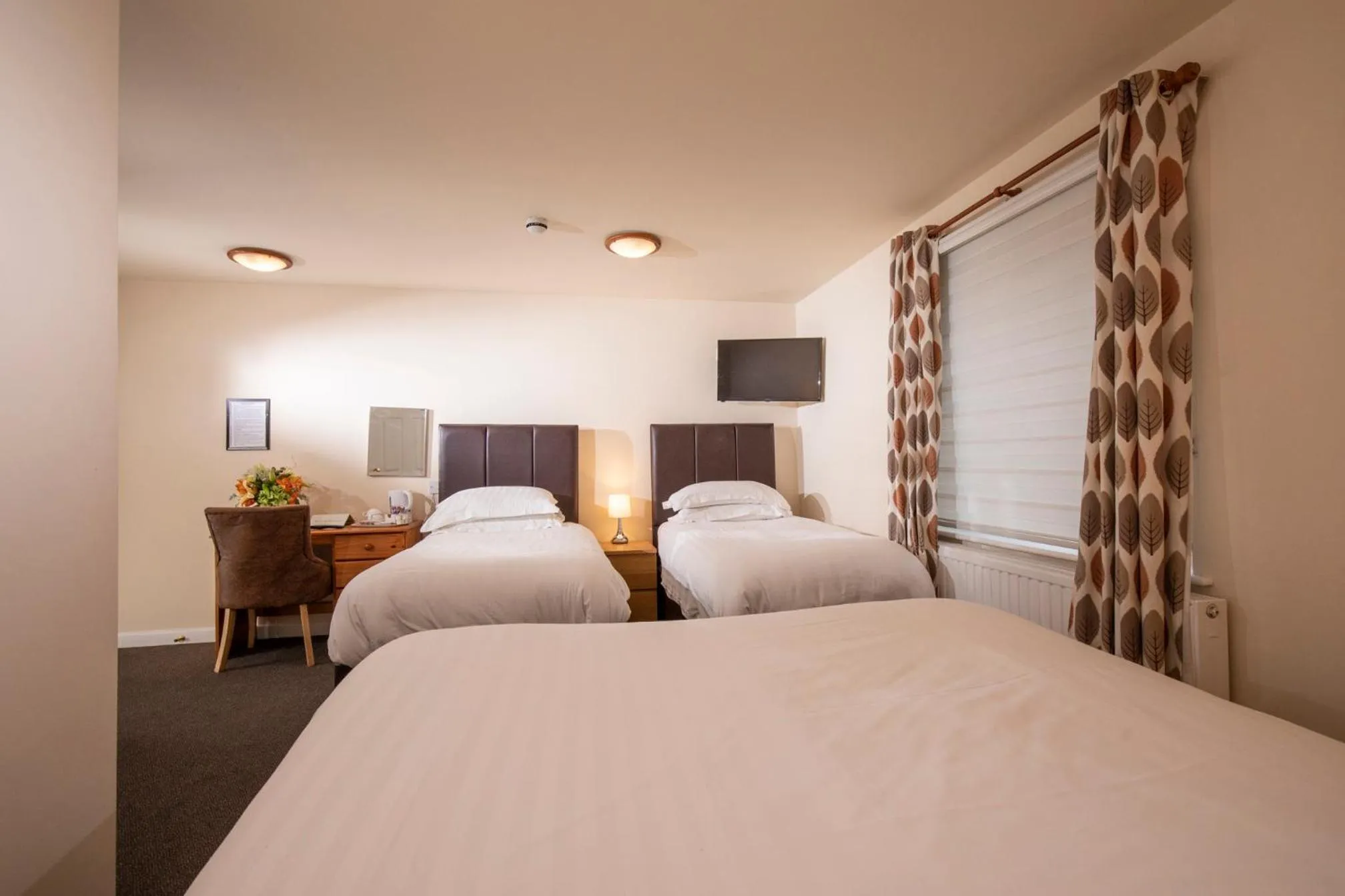 Bed in The Cock Inn Hotel