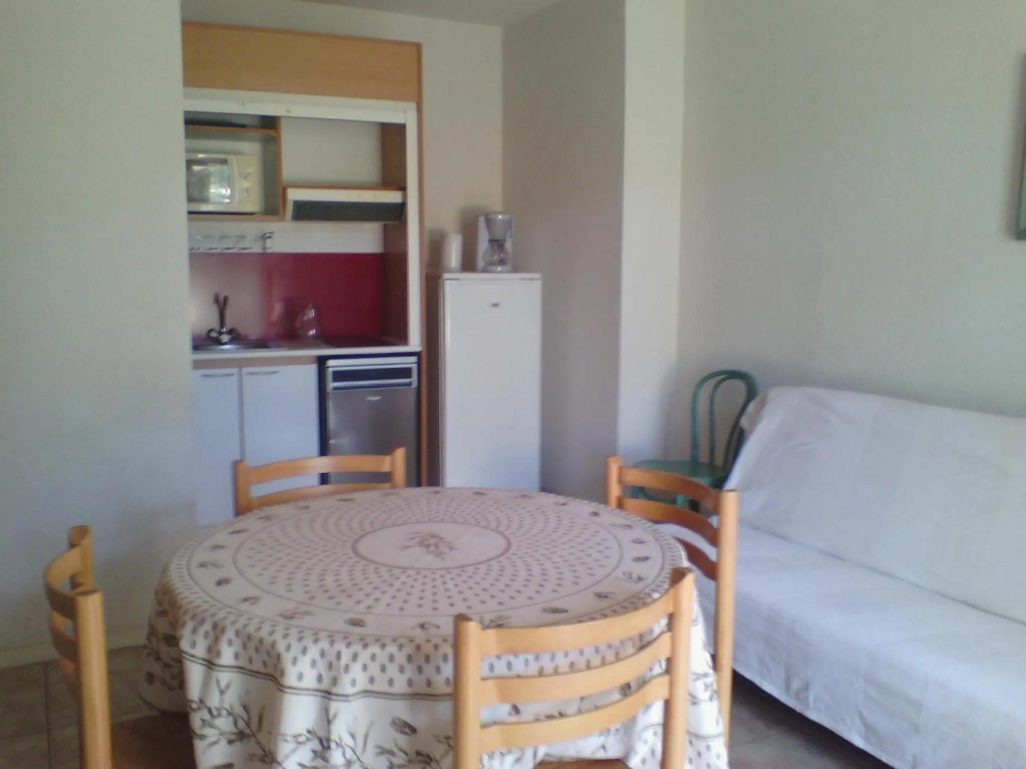 Kitchen or kitchenette in Hôtel De La Mer