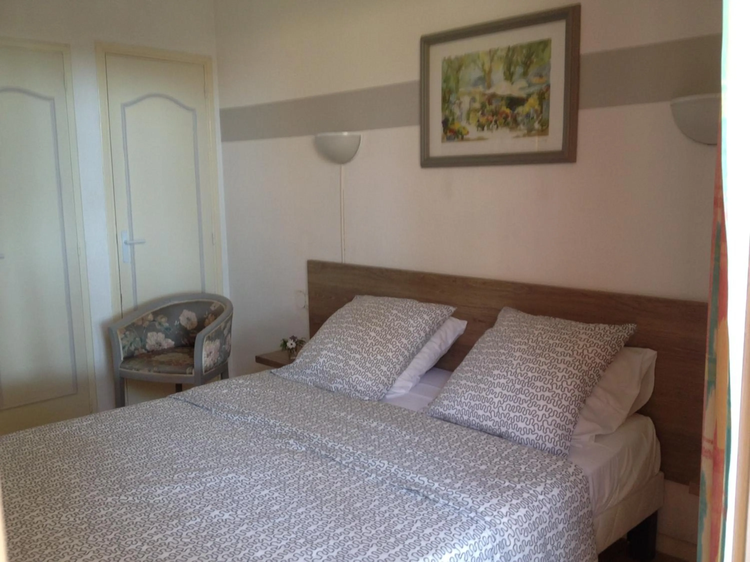 Bed in Hôtel De La Mer