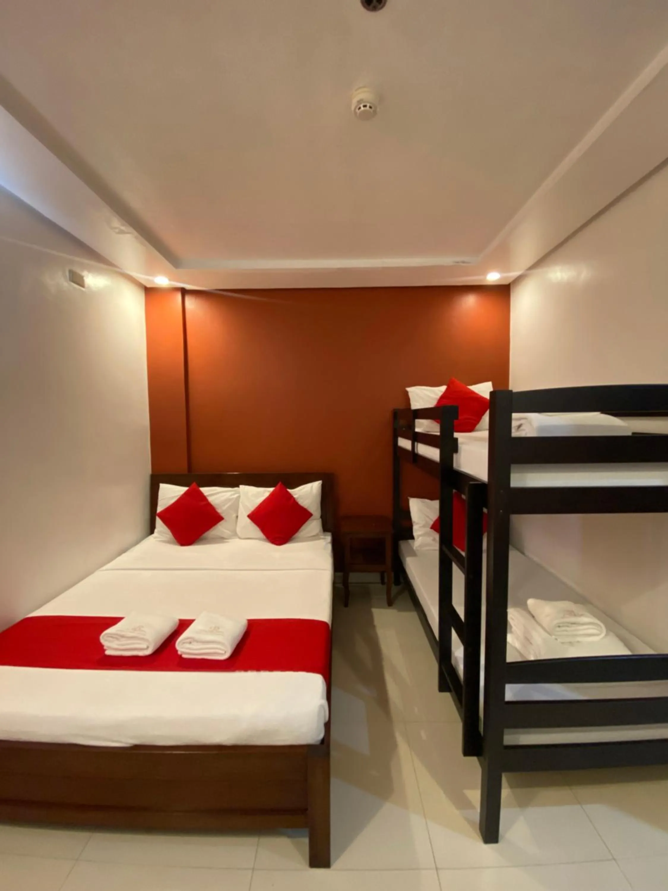 Bed in Royale Parc Hotel Puerto Princesa Palawan