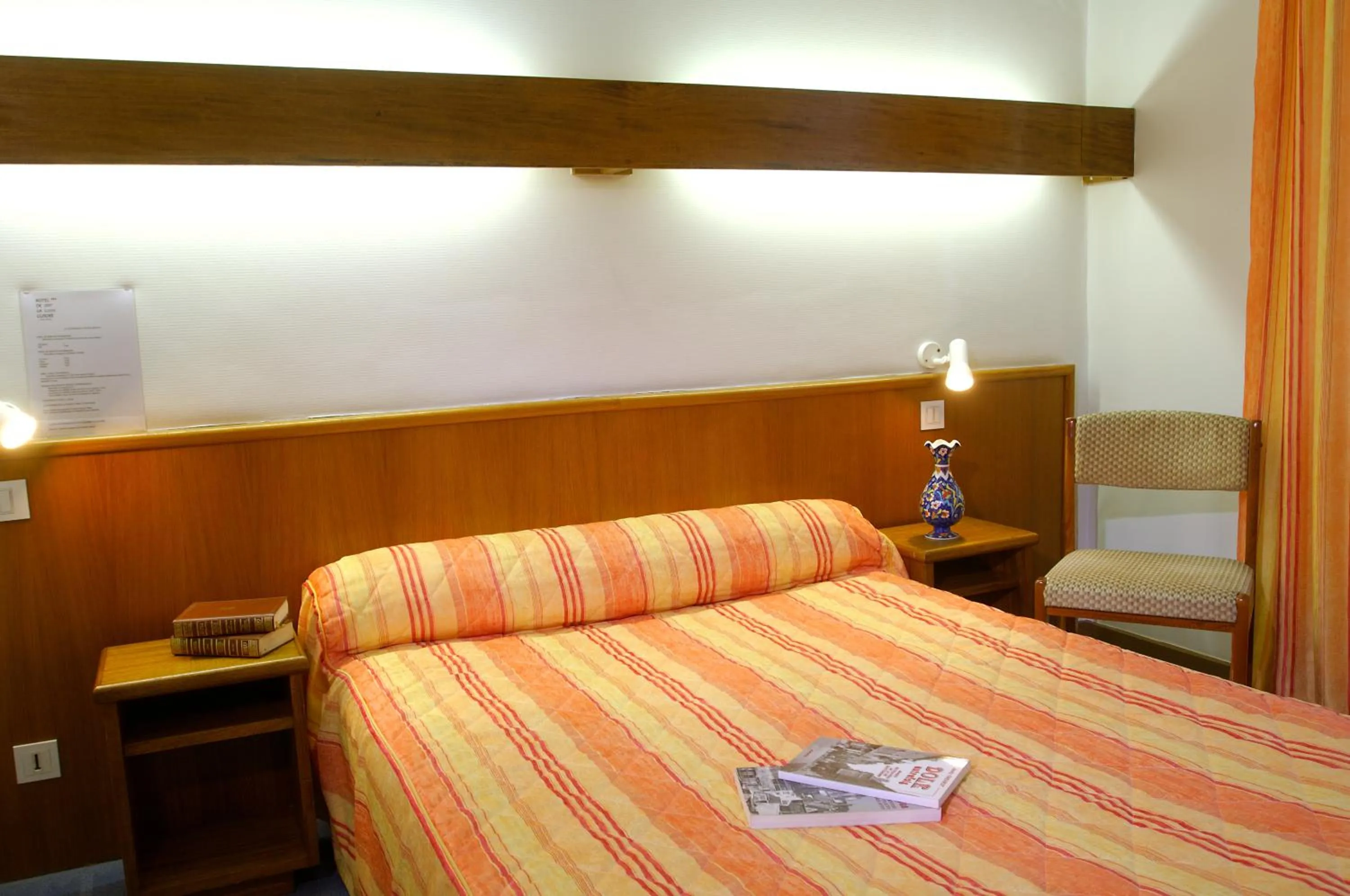 Photo of the whole room, Bed in Hôtel de La Cloche