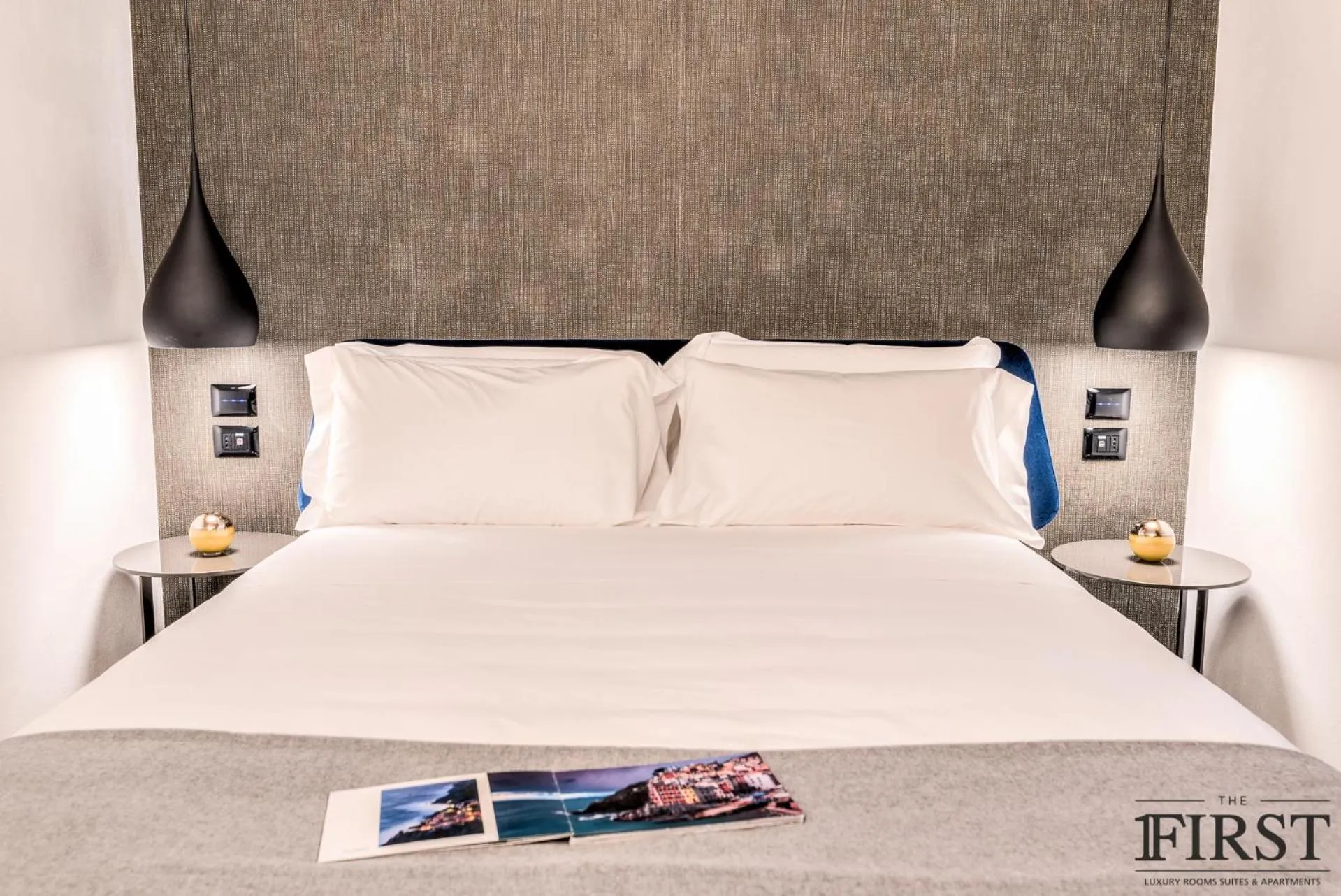 Decorative detail, Bed in La Spezia by The First - Luxury Rooms & Suites