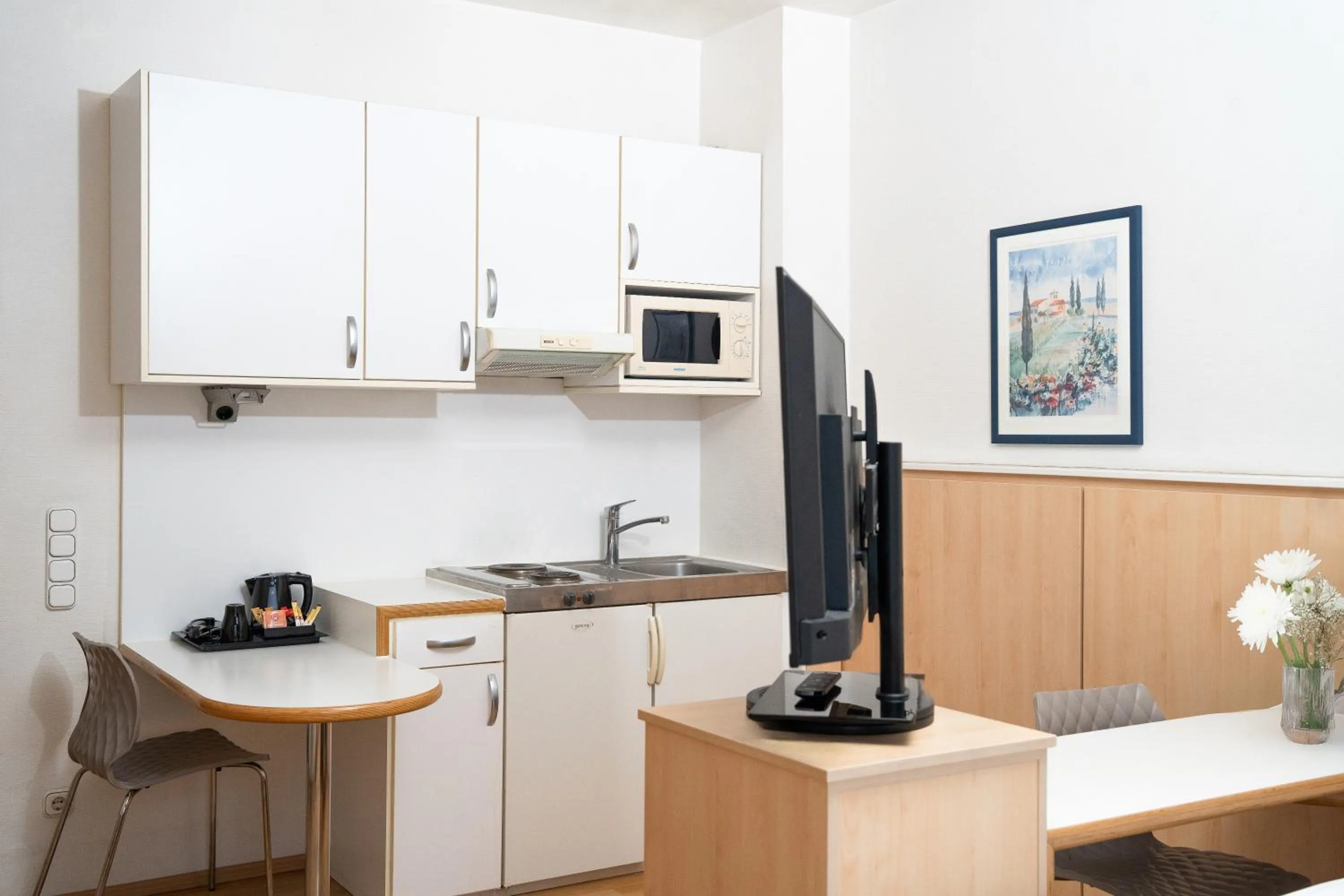 Kitchen or kitchenette in Astor & Aparthotel