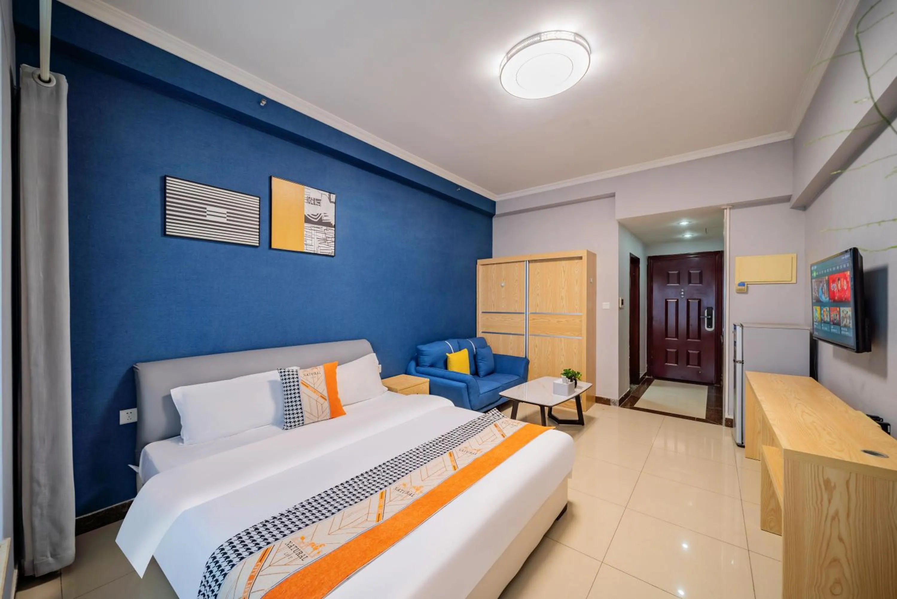 Bed in Pazhou Angda International Aparthotel Canton Fair Branch