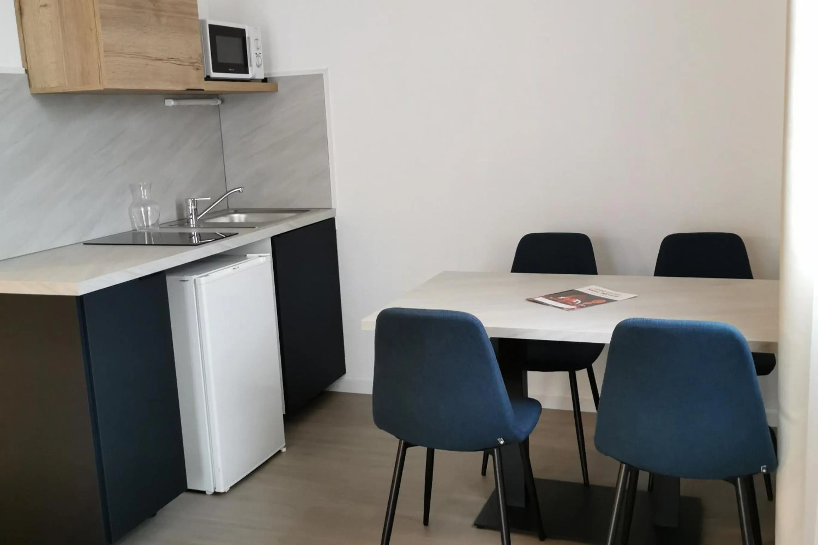 Kitchen or kitchenette in City Résidence Nancy