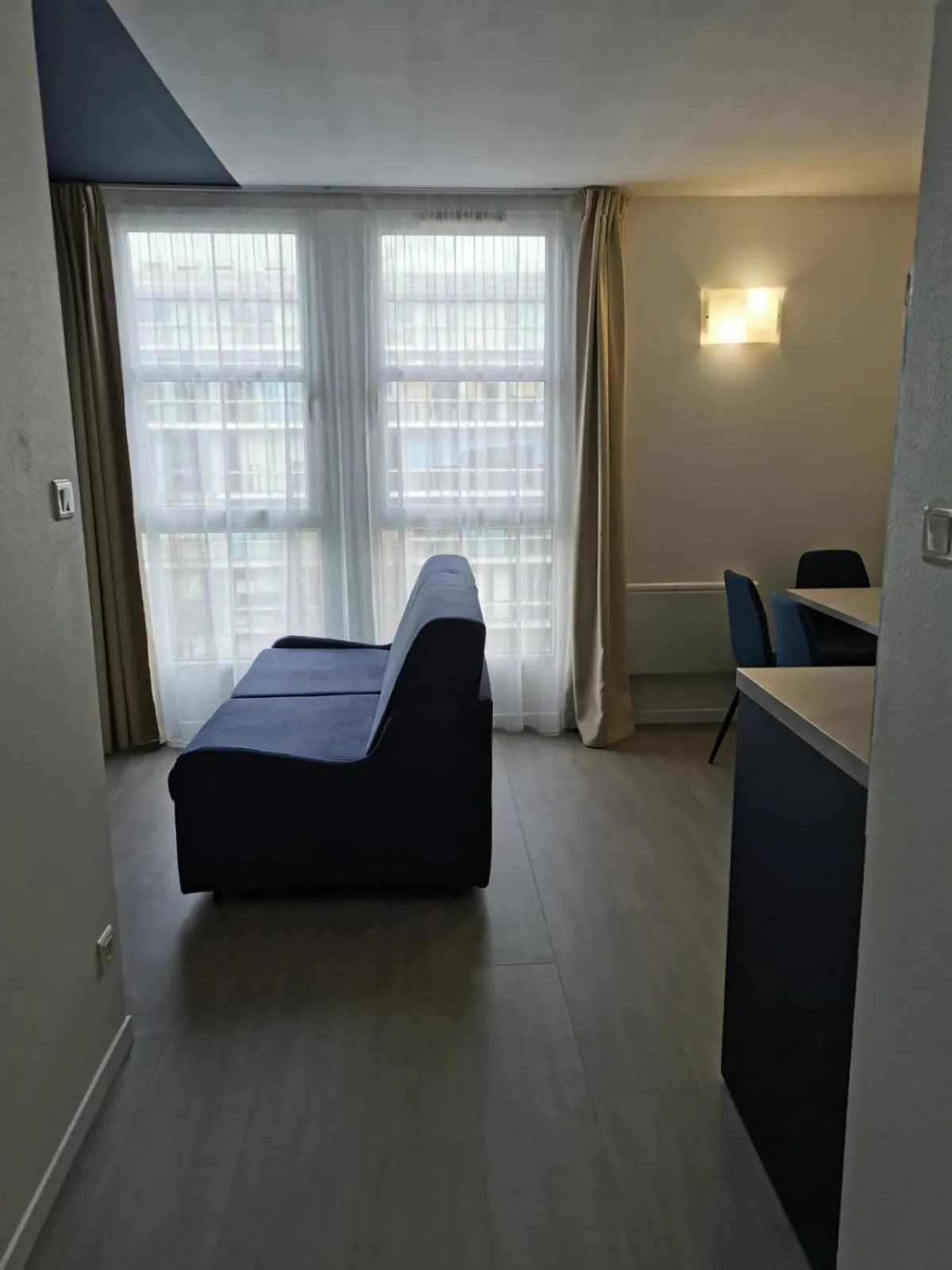 Seating area, Bed in City Résidence Nancy