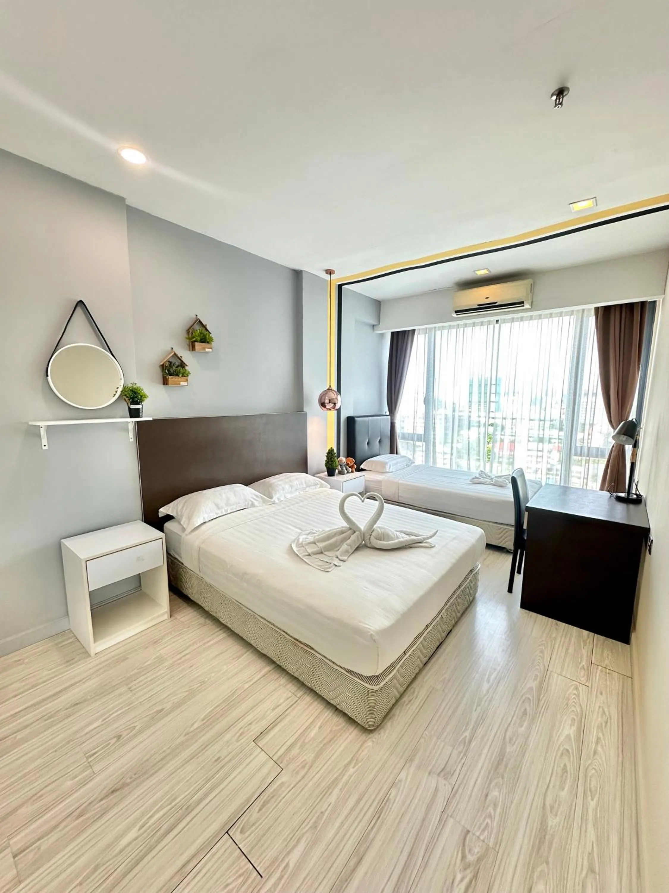 Bed in Cozy Living Sky Apartment