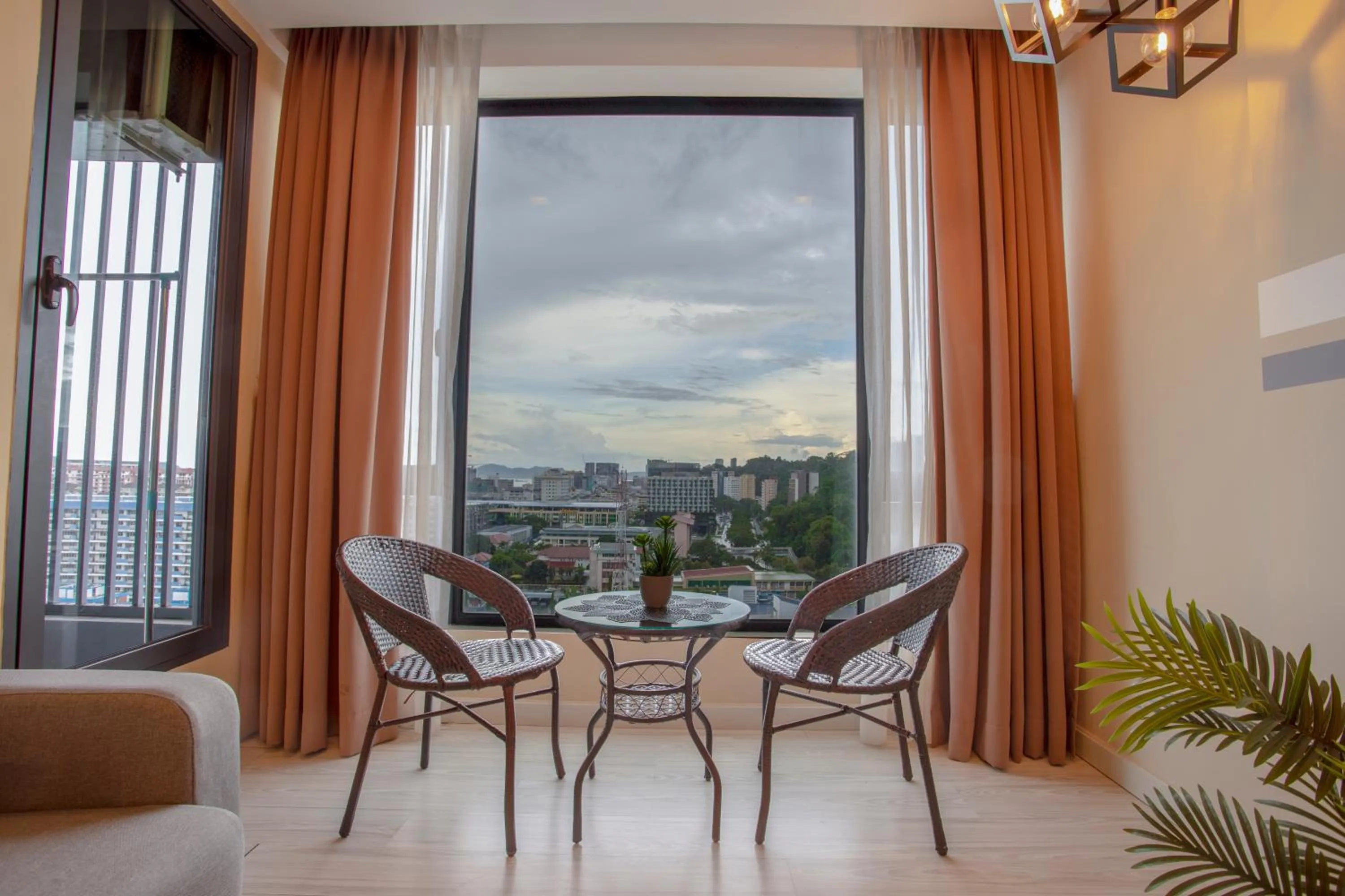 Seating area in Cozy Living Sky Apartment