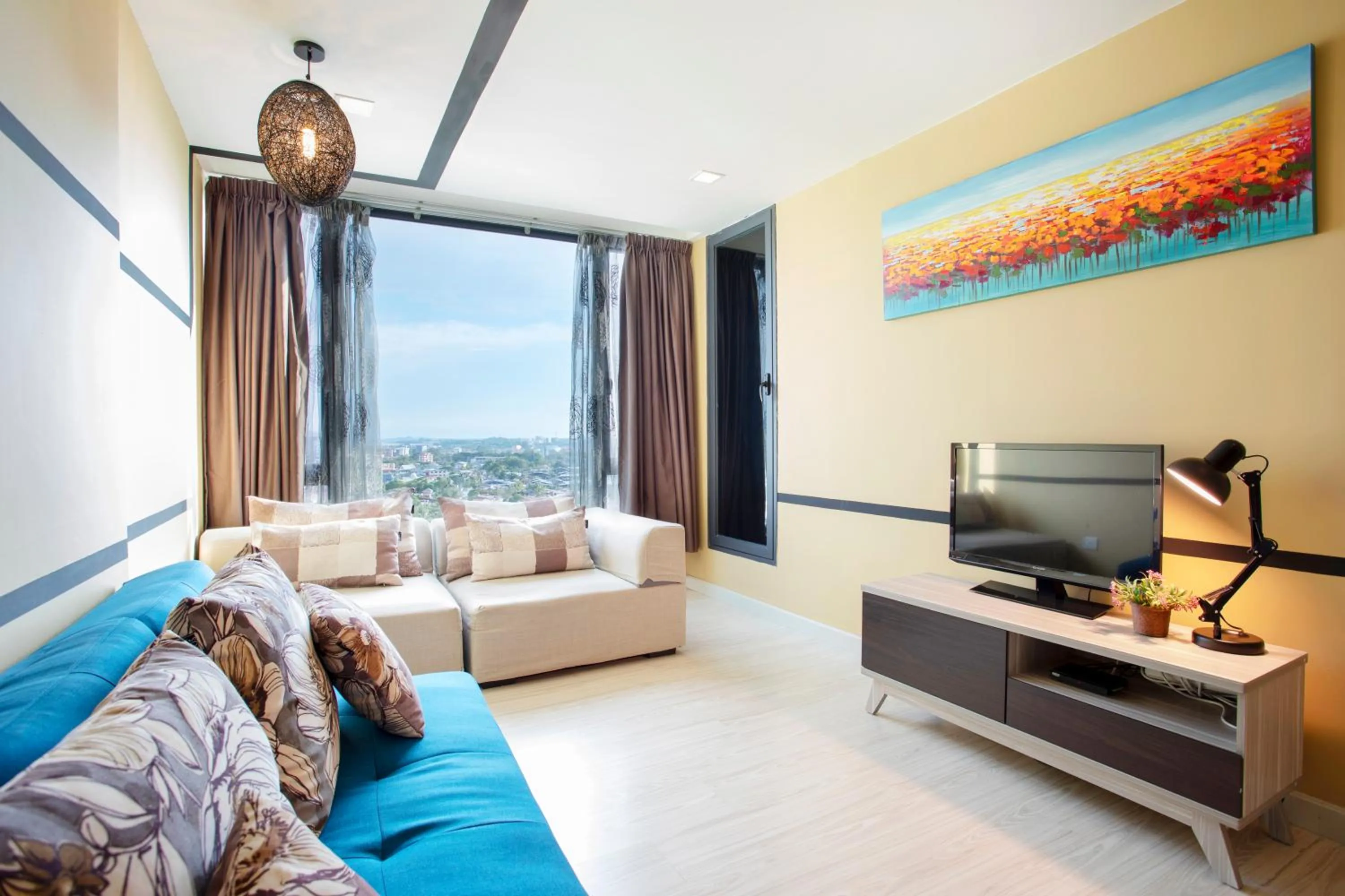 Living room, Bed in Cozy Living Sky Apartment