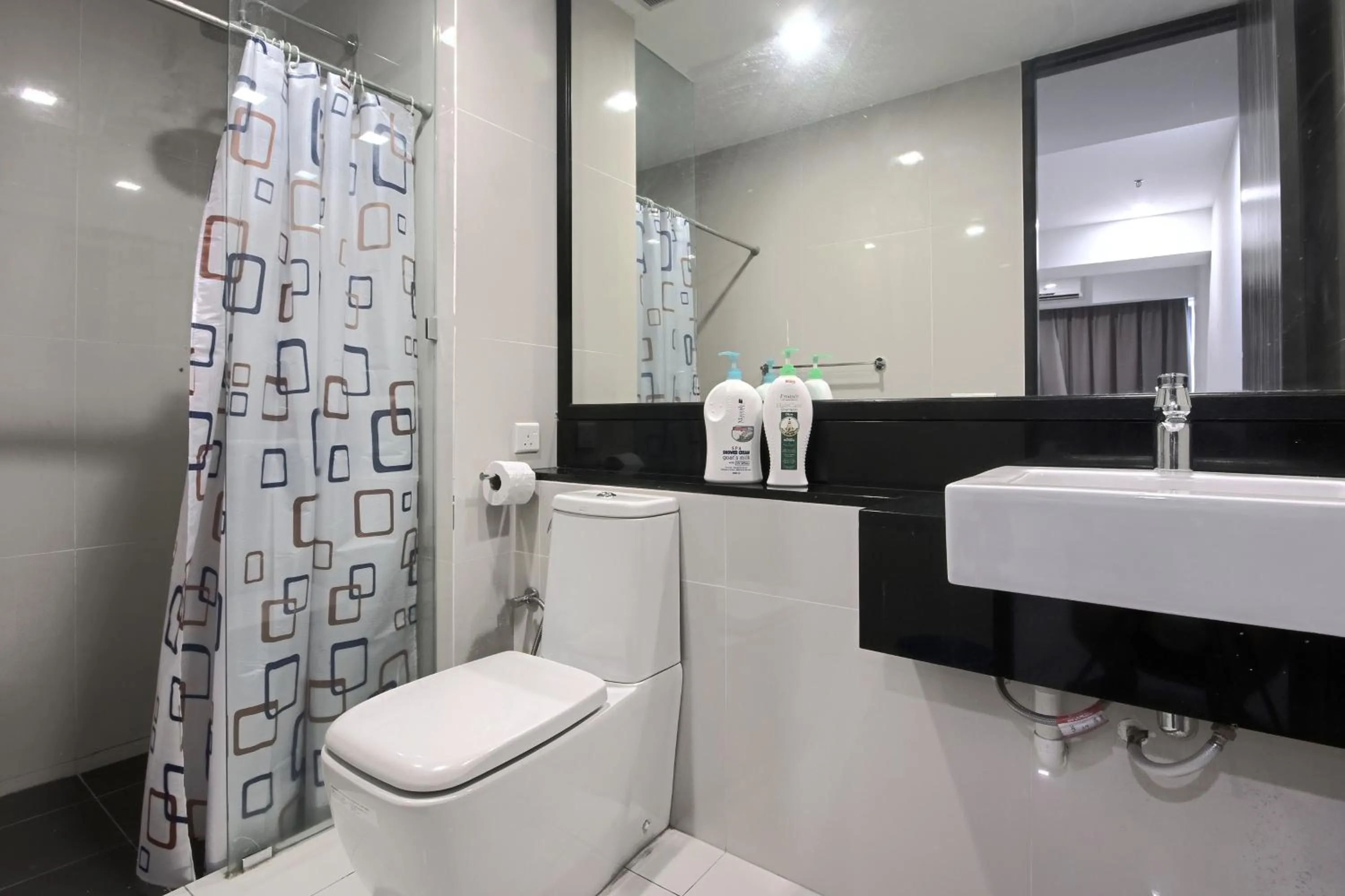 Bathroom in Cozy Living Sky Apartment