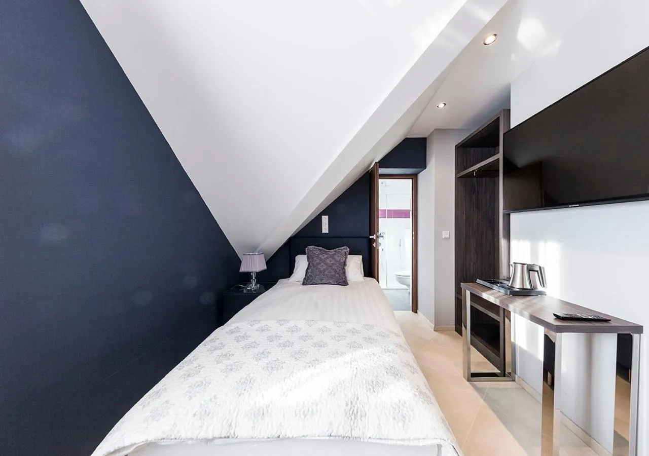 Bed in Hotel Tommasi