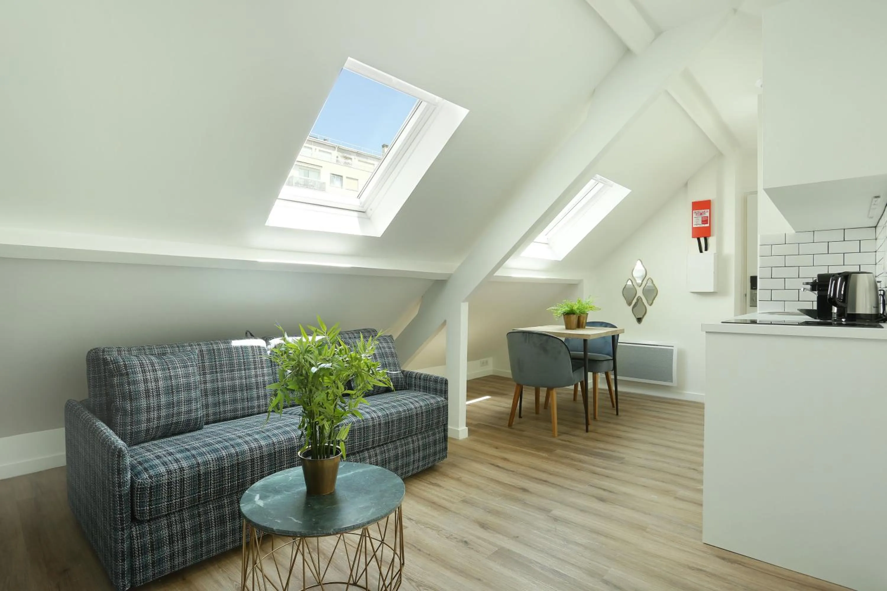 Living room in YAYS Paris Zola by Numa