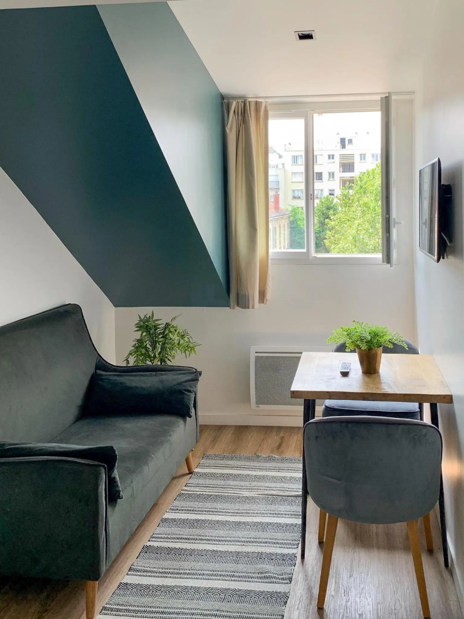 Seating area in YAYS Paris Zola by Numa