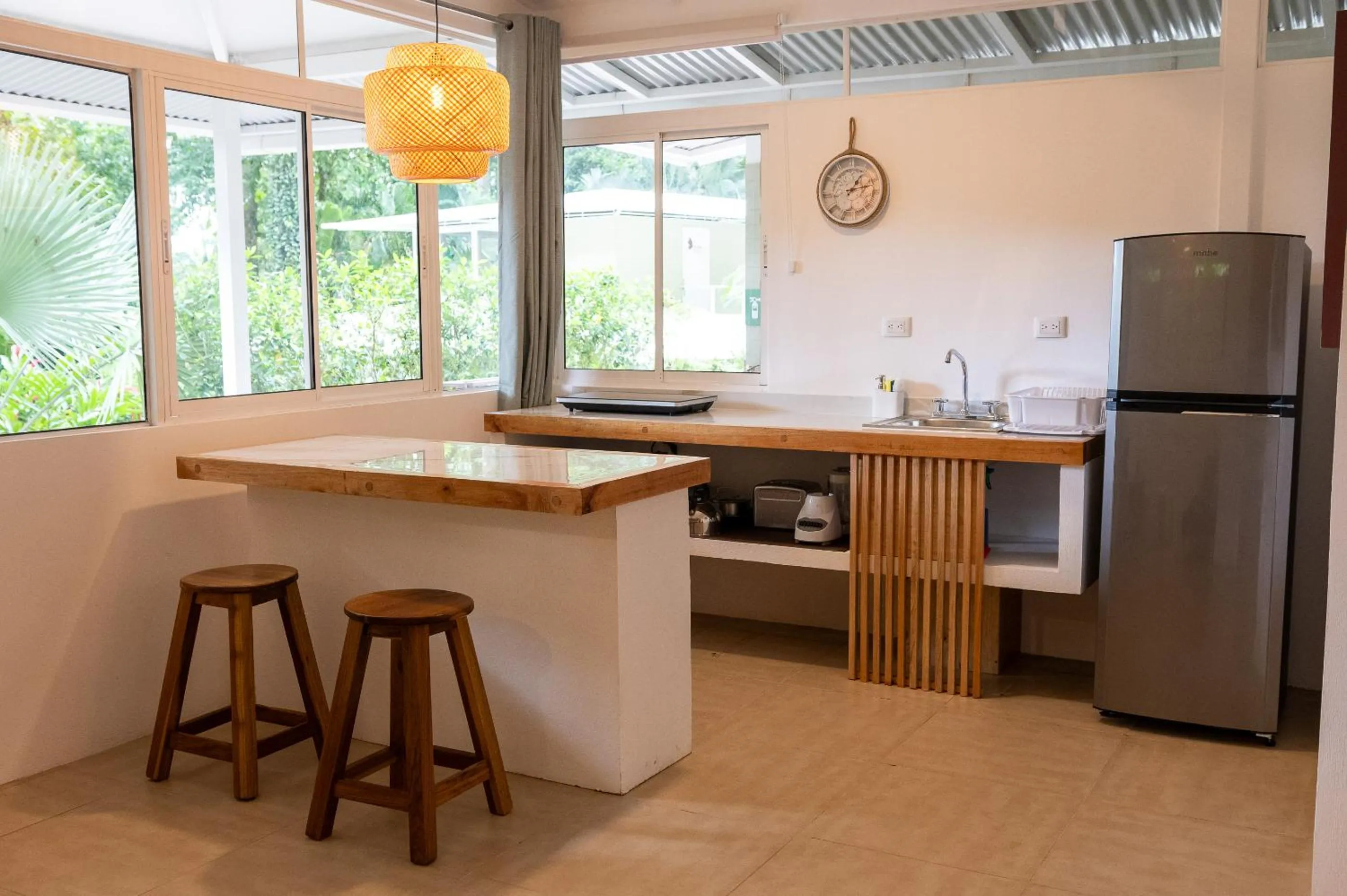 Kitchen or kitchenette in Jaguar Inn Bungalows