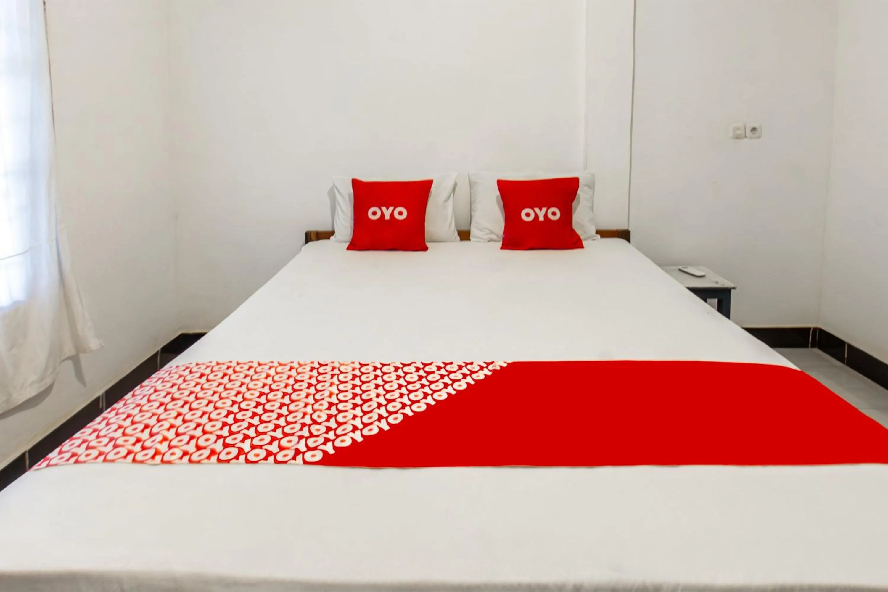 Bedroom, Bed in Hotel O Kawi Homestay