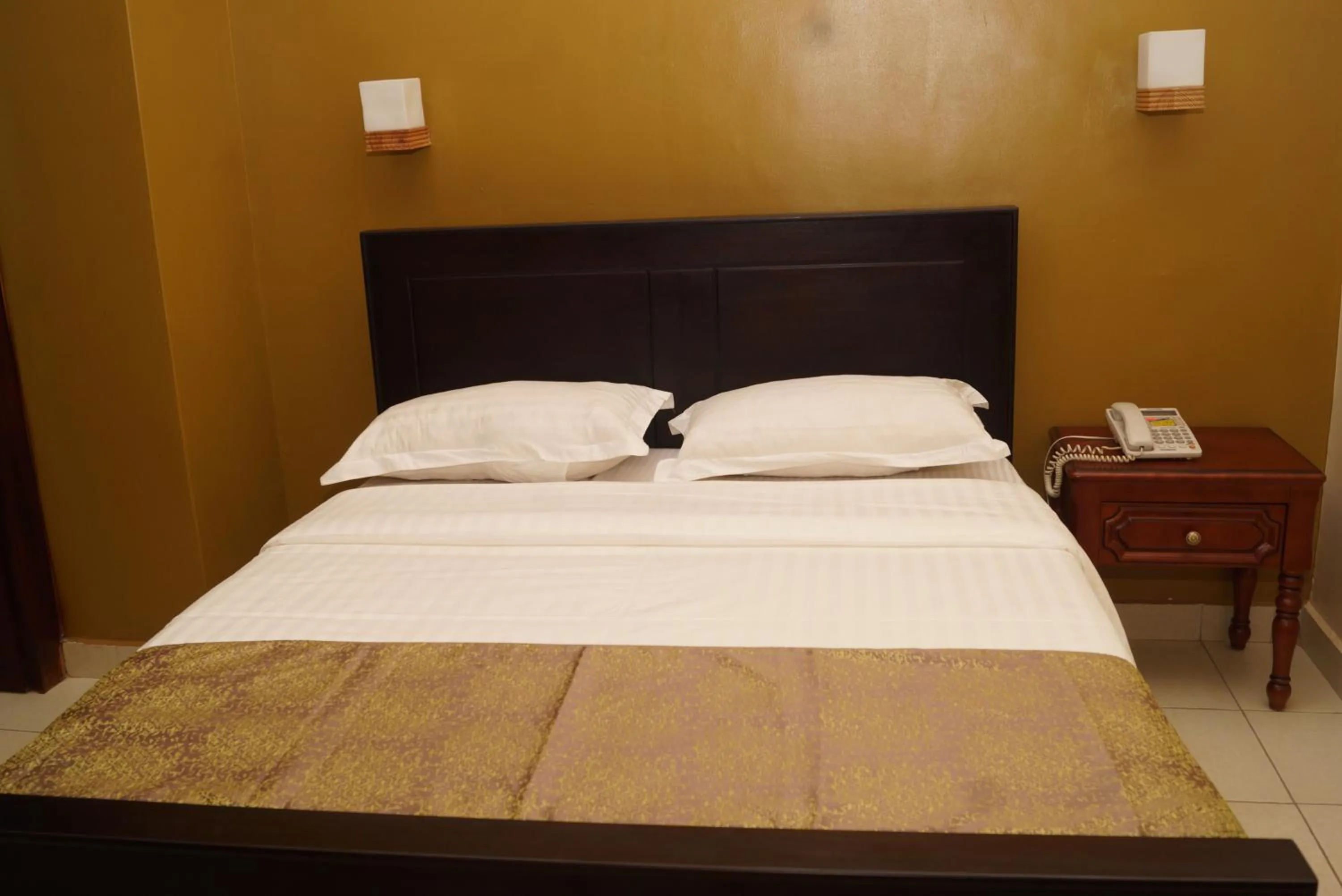 Bed in Diamonds Hotel Kampala