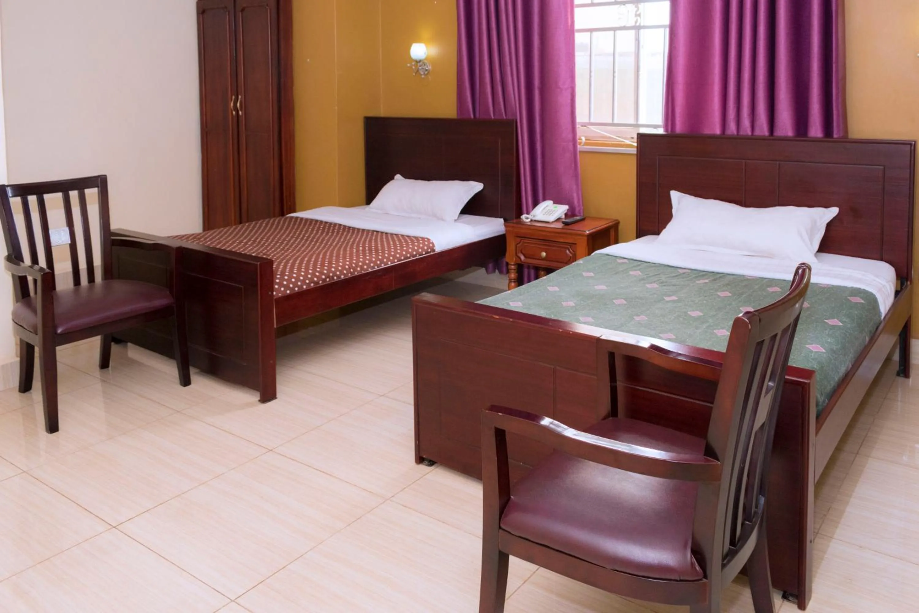 Bed in Diamonds Hotel Kampala