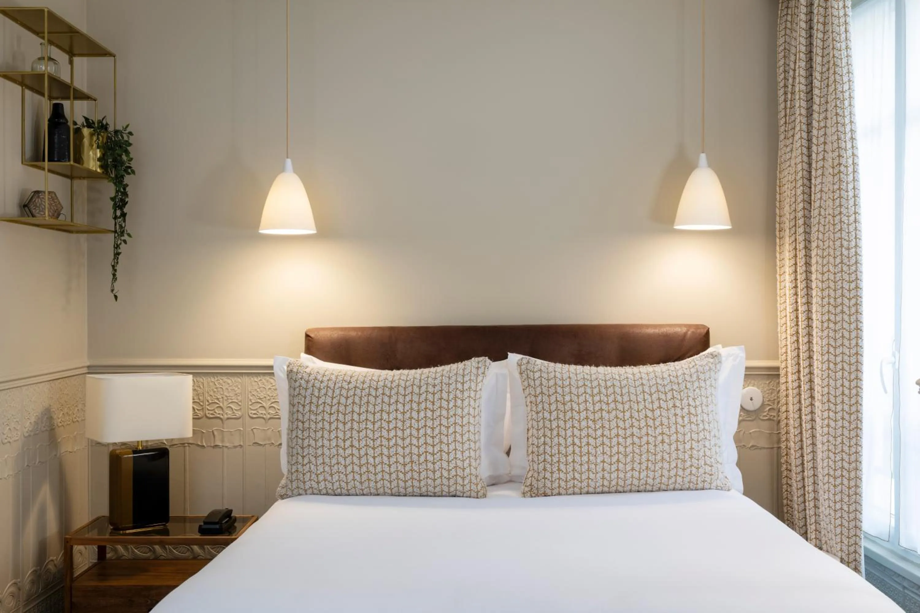 Bed in Hôtel Madeleine Haussmann