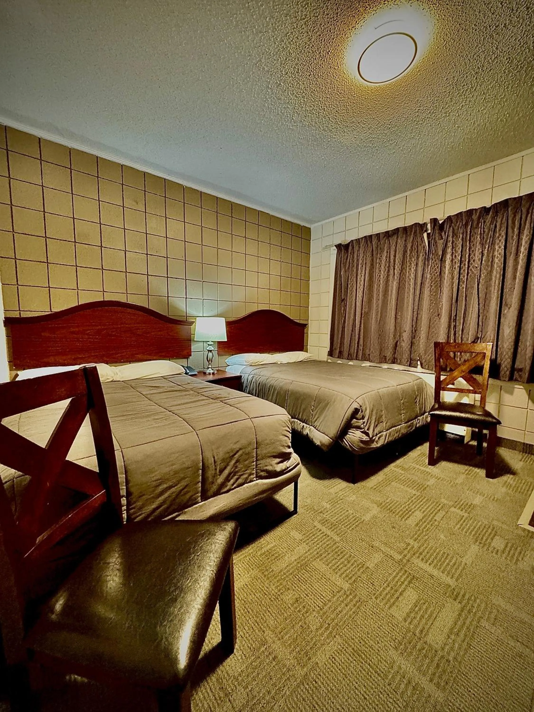 Bed in Caravel Motel