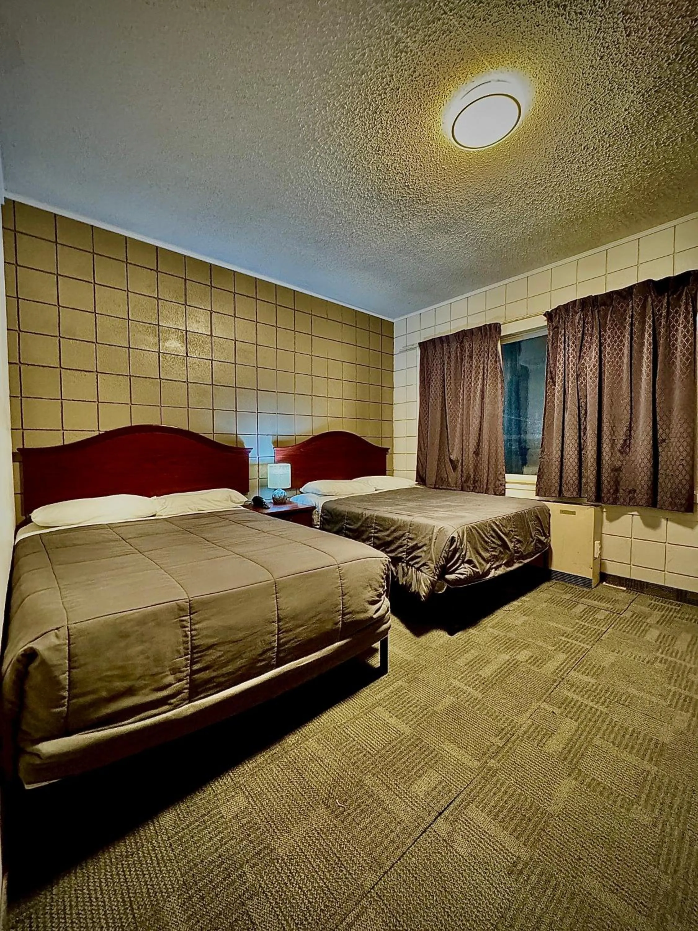 Bed in Caravel Motel